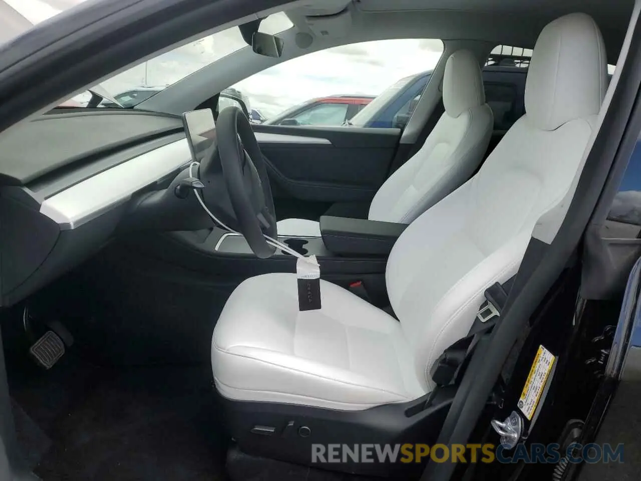 7 Photograph of a damaged car 7SAYGDEE9RA323200 TESLA MODEL Y 2024