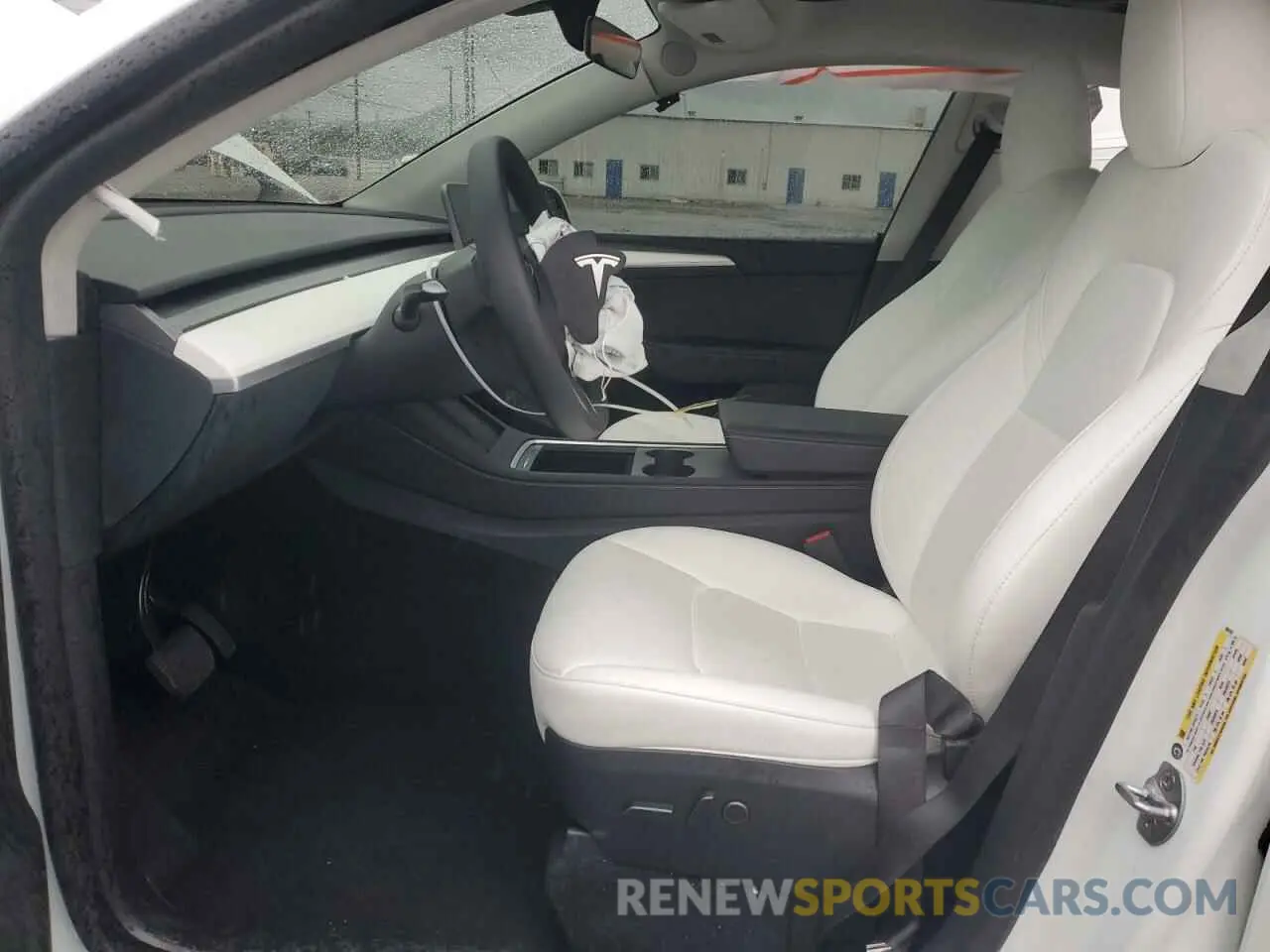 7 Photograph of a damaged car 7SAYGDEE9RF002292 TESLA MODEL Y 2024