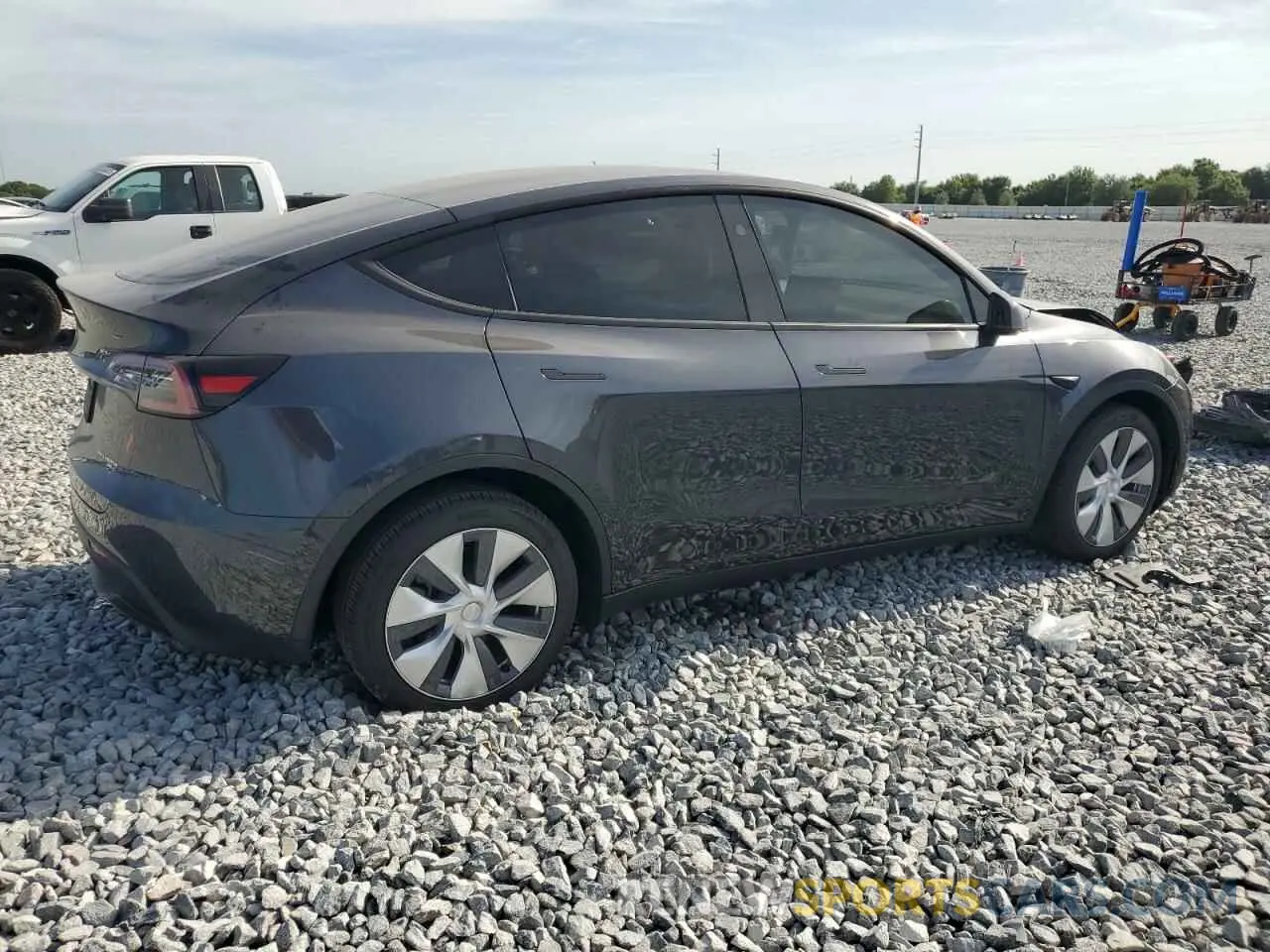 3 Photograph of a damaged car 7SAYGDEEXRA230413 TESLA MODEL Y 2024