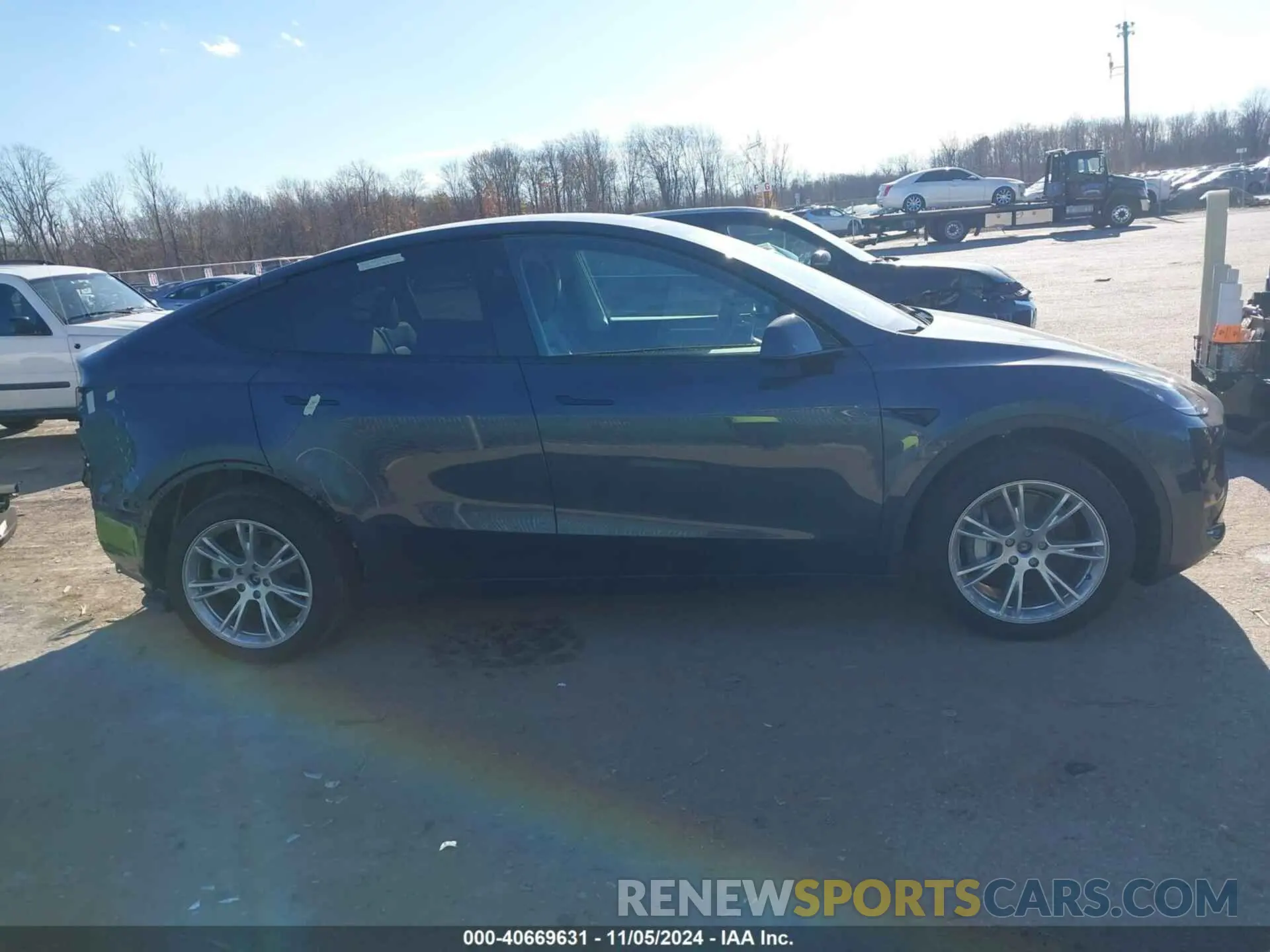 14 Photograph of a damaged car 7SAYGDEEXRA250886 TESLA MODEL Y 2024