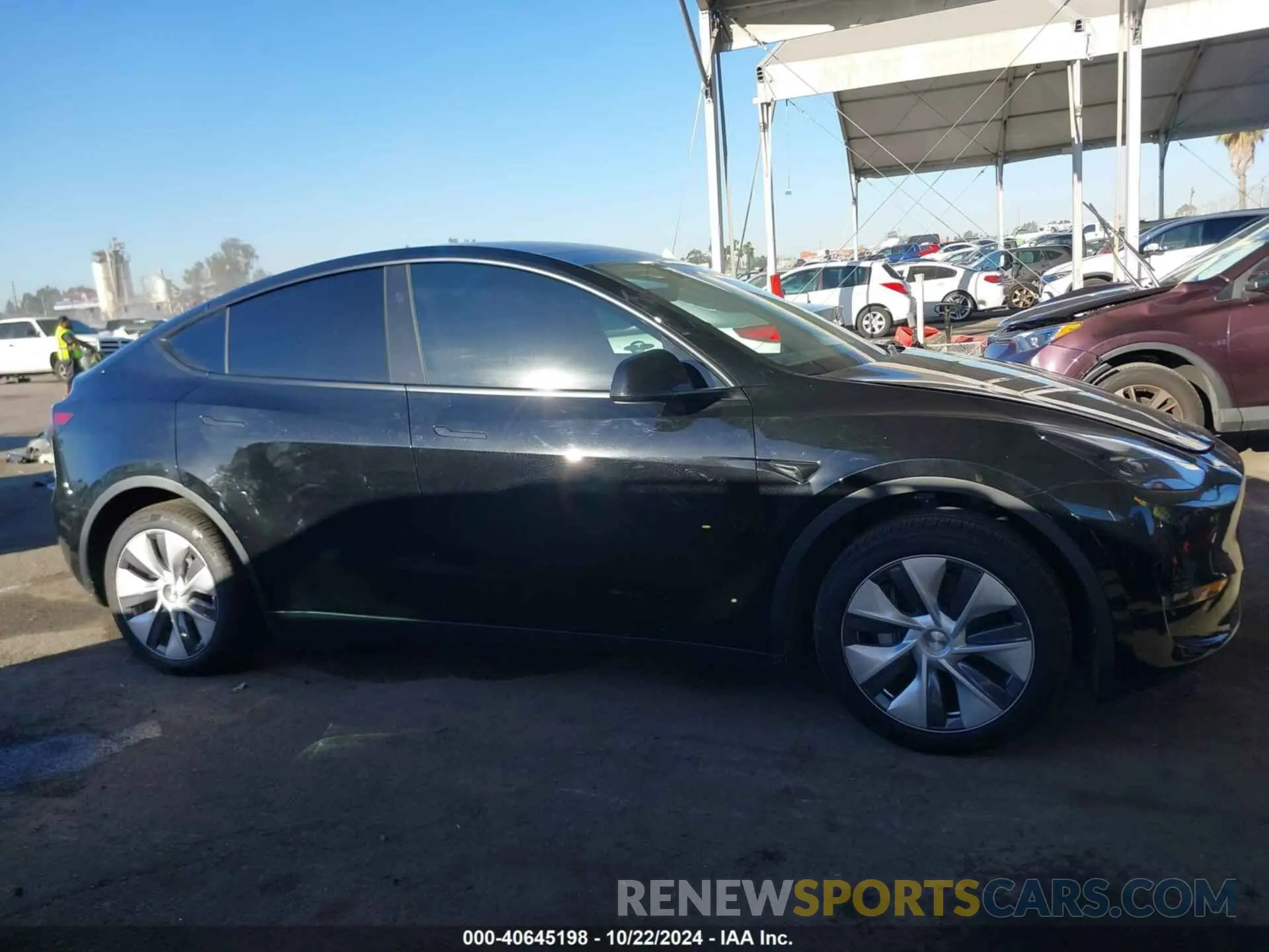 13 Photograph of a damaged car 7SAYGDEEXRA252203 TESLA MODEL Y 2024