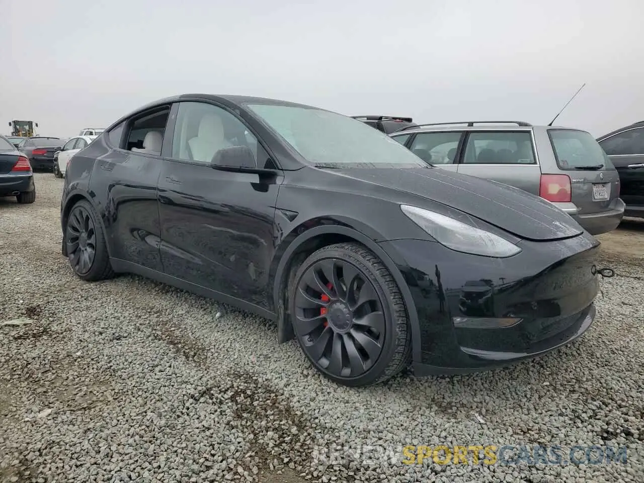 4 Photograph of a damaged car 7SAYGDEF1RF028278 TESLA MODEL Y 2024