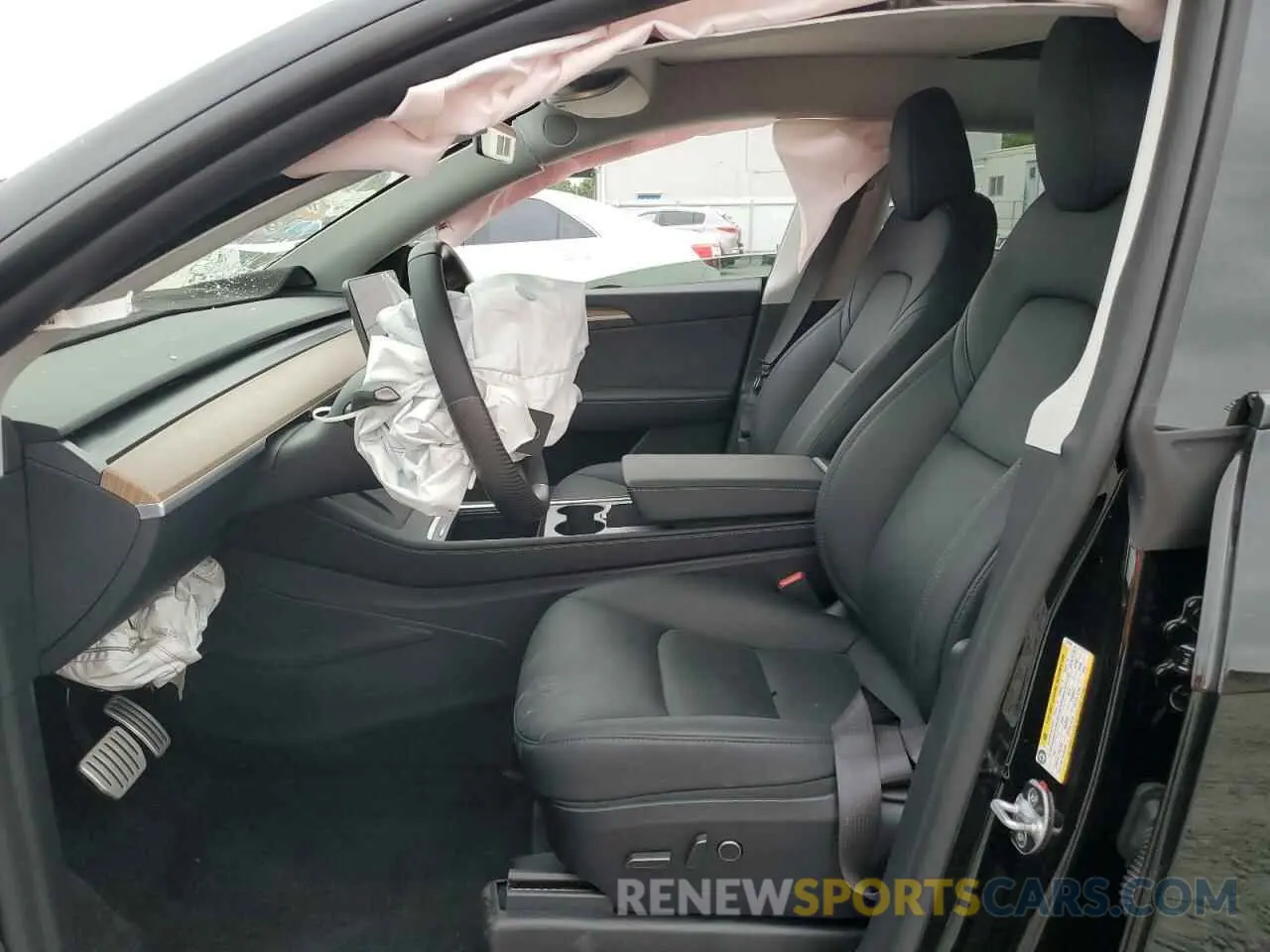 7 Photograph of a damaged car 7SAYGDEF4RA310704 TESLA MODEL Y 2024