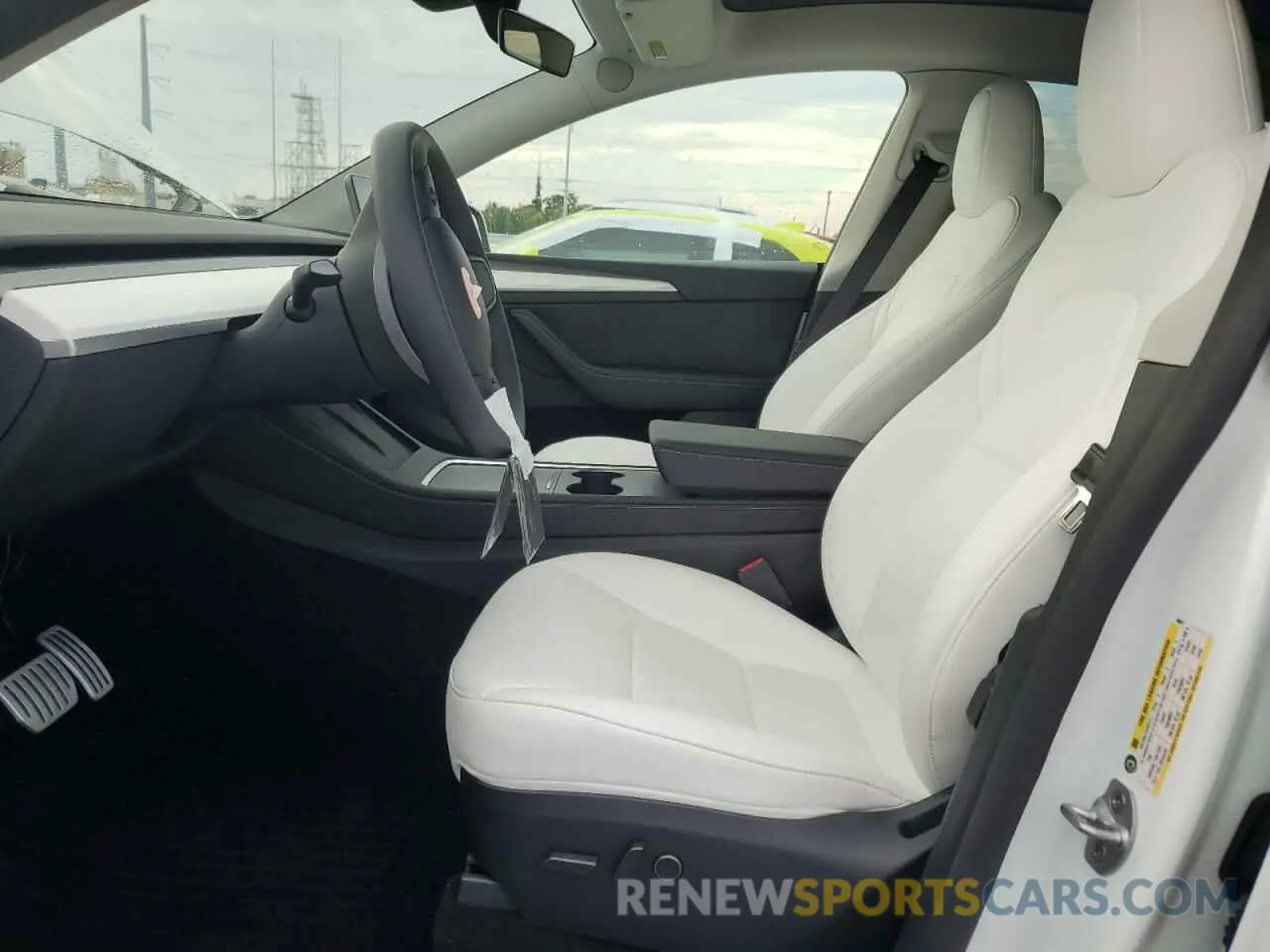 7 Photograph of a damaged car 7SAYGDEF5RF046511 TESLA MODEL Y 2024