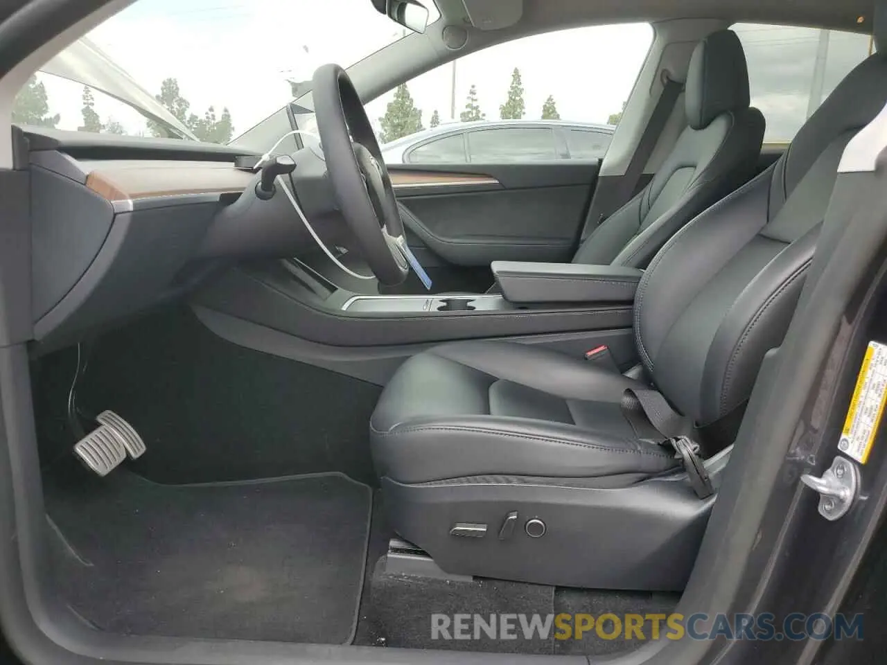 7 Photograph of a damaged car 7SAYGDEF5RF125127 TESLA MODEL Y 2024