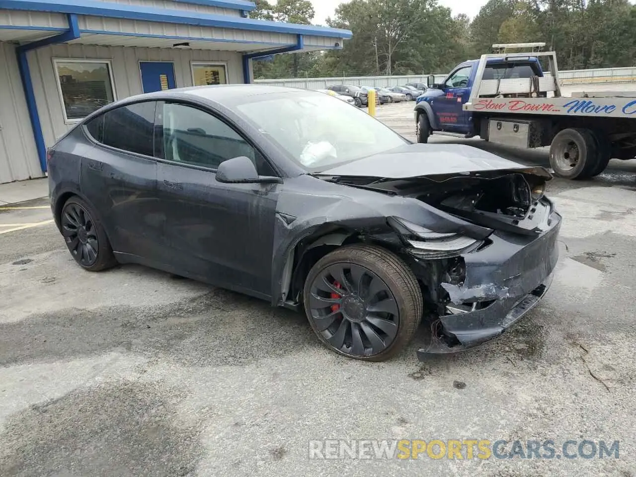 4 Photograph of a damaged car 7SAYGDEF9RF041554 TESLA MODEL Y 2024