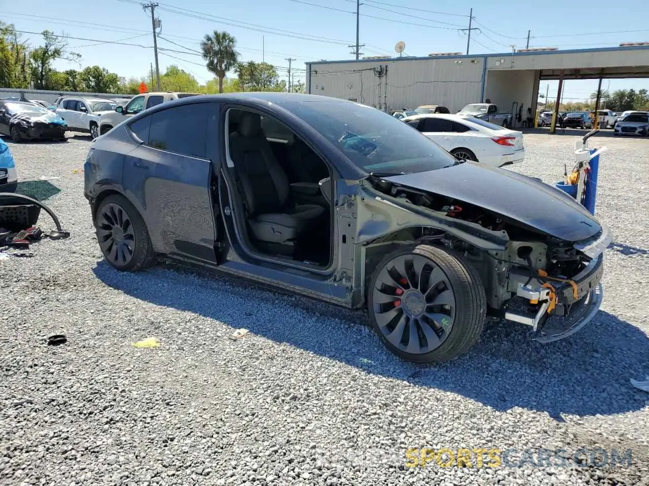 4 Photograph of a damaged car 7SAYGDEFXRA271486 TESLA MODEL Y 2024