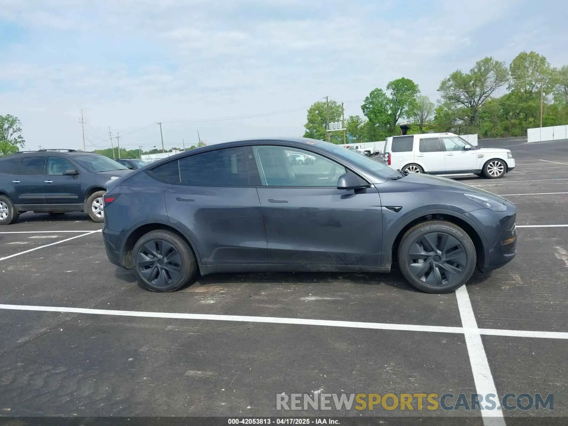 13 Photograph of a damaged car 7SAYGDED0SA354137 TESLA MODEL Y 2025