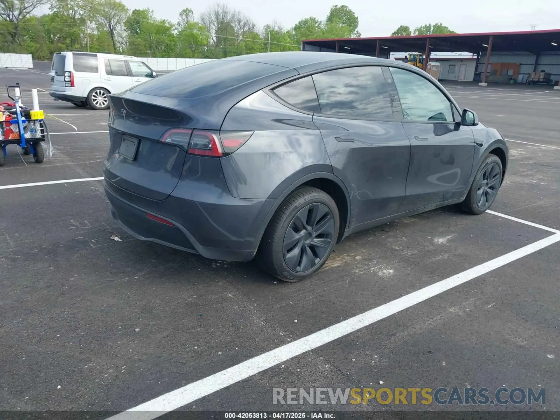 4 Photograph of a damaged car 7SAYGDED0SA354137 TESLA MODEL Y 2025