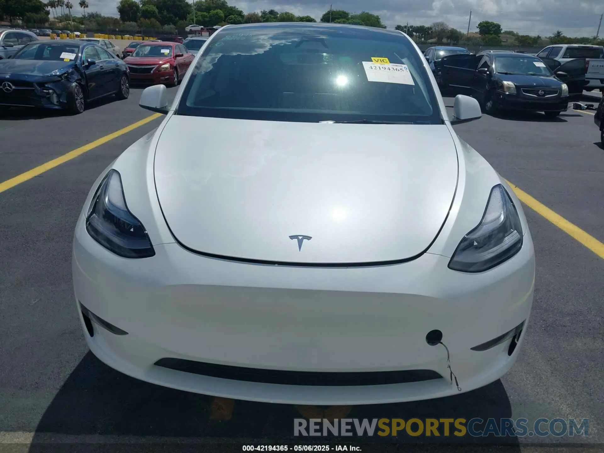 12 Photograph of a damaged car 7SAYGDED0SA357958 TESLA MODEL Y 2025