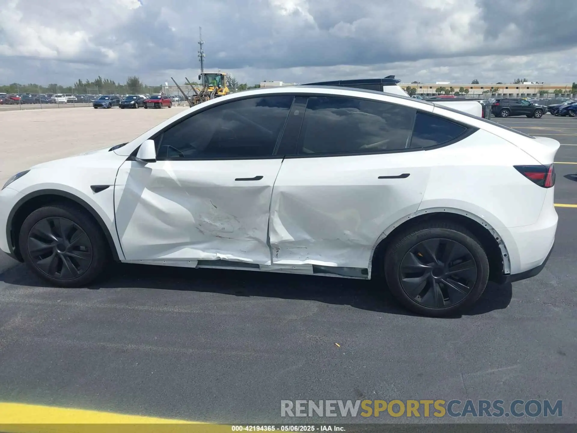 14 Photograph of a damaged car 7SAYGDED0SA357958 TESLA MODEL Y 2025