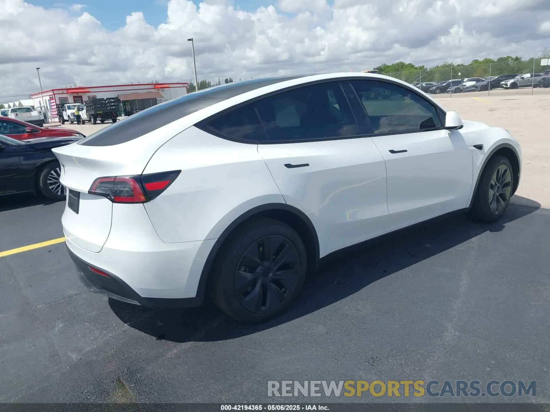 4 Photograph of a damaged car 7SAYGDED0SA357958 TESLA MODEL Y 2025