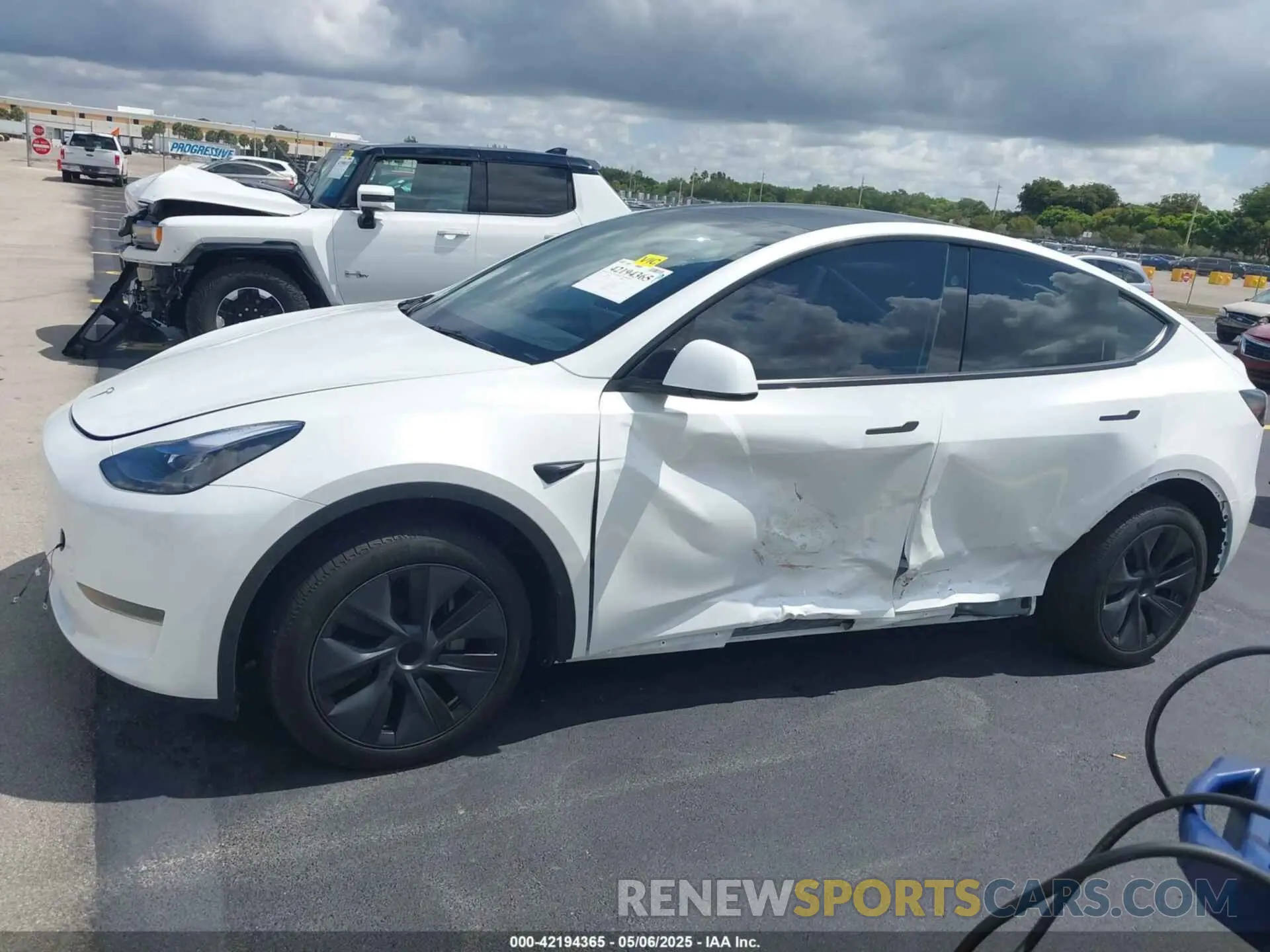 6 Photograph of a damaged car 7SAYGDED0SA357958 TESLA MODEL Y 2025