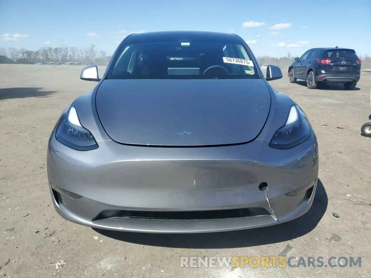5 Photograph of a damaged car 7SAYGDED0SF247561 TESLA MODEL Y 2025