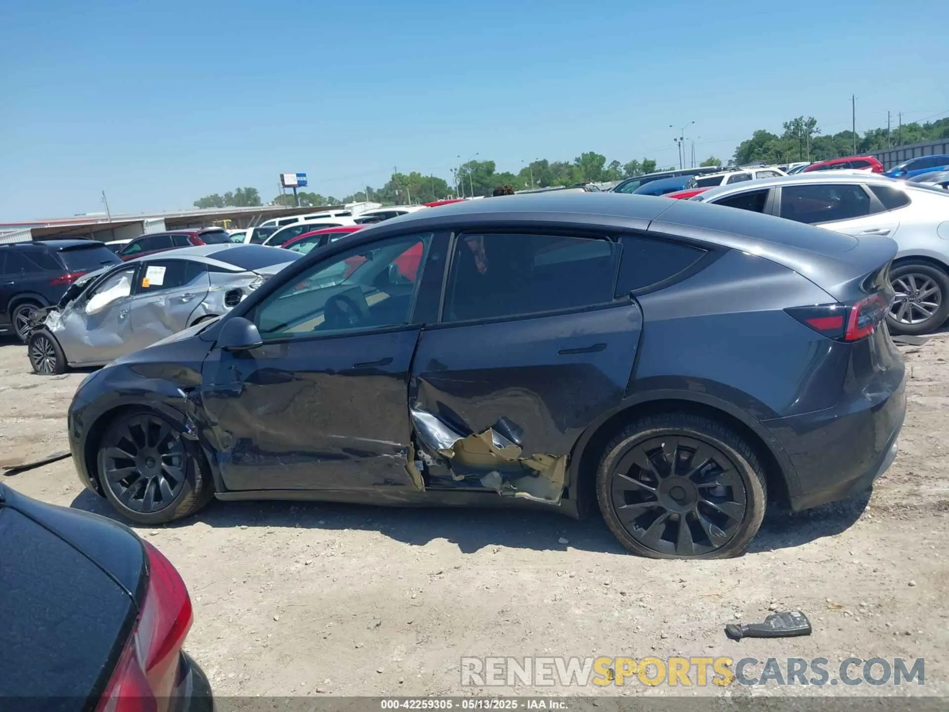 13 Photograph of a damaged car 7SAYGDED1SA357841 TESLA MODEL Y 2025