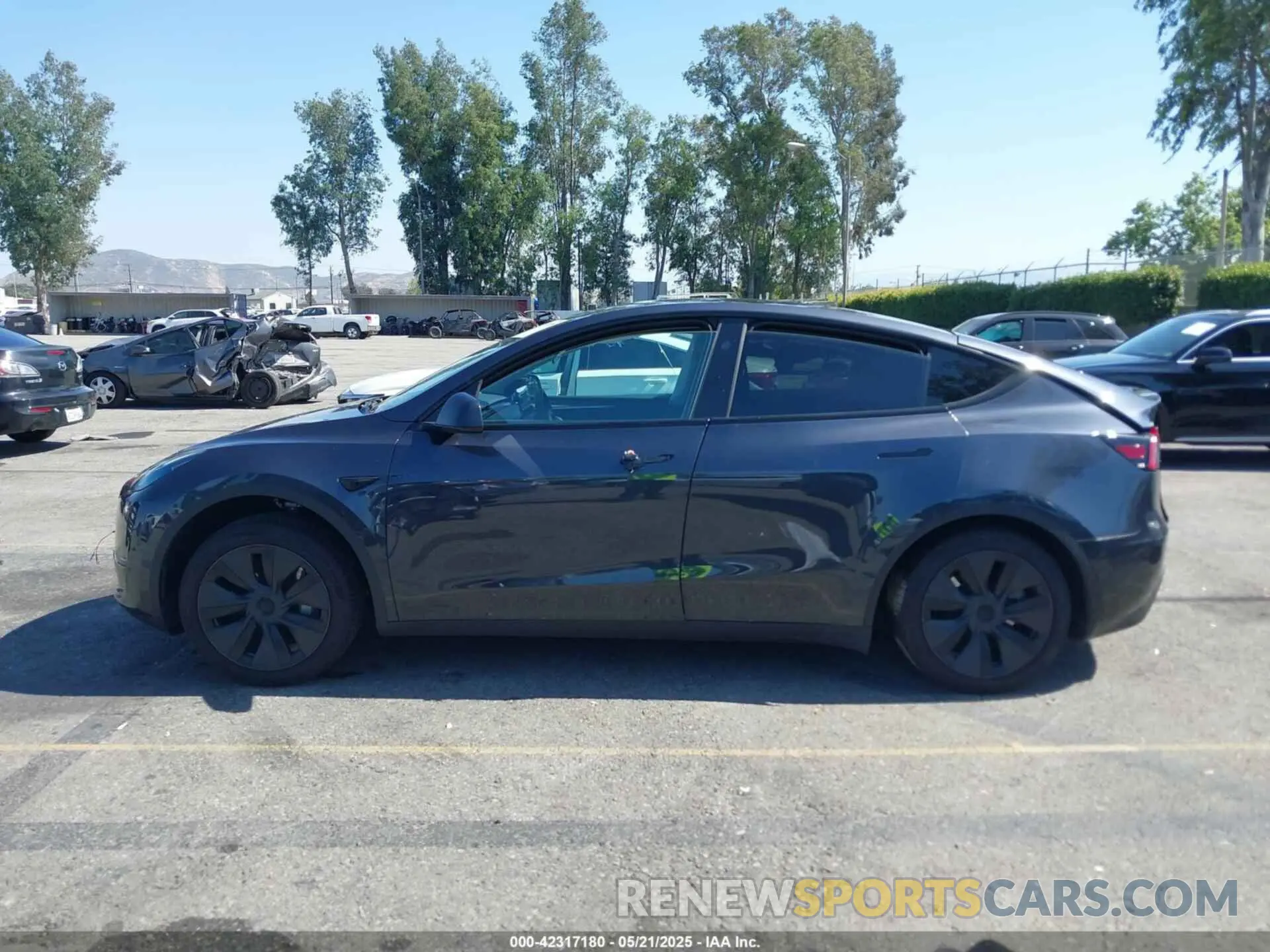 14 Photograph of a damaged car 7SAYGDED1SF220689 TESLA MODEL Y 2025