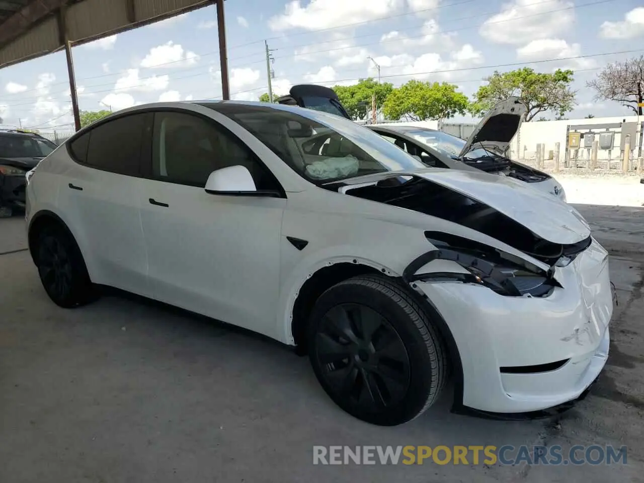 4 Photograph of a damaged car 7SAYGDED3SA374902 TESLA MODEL Y 2025