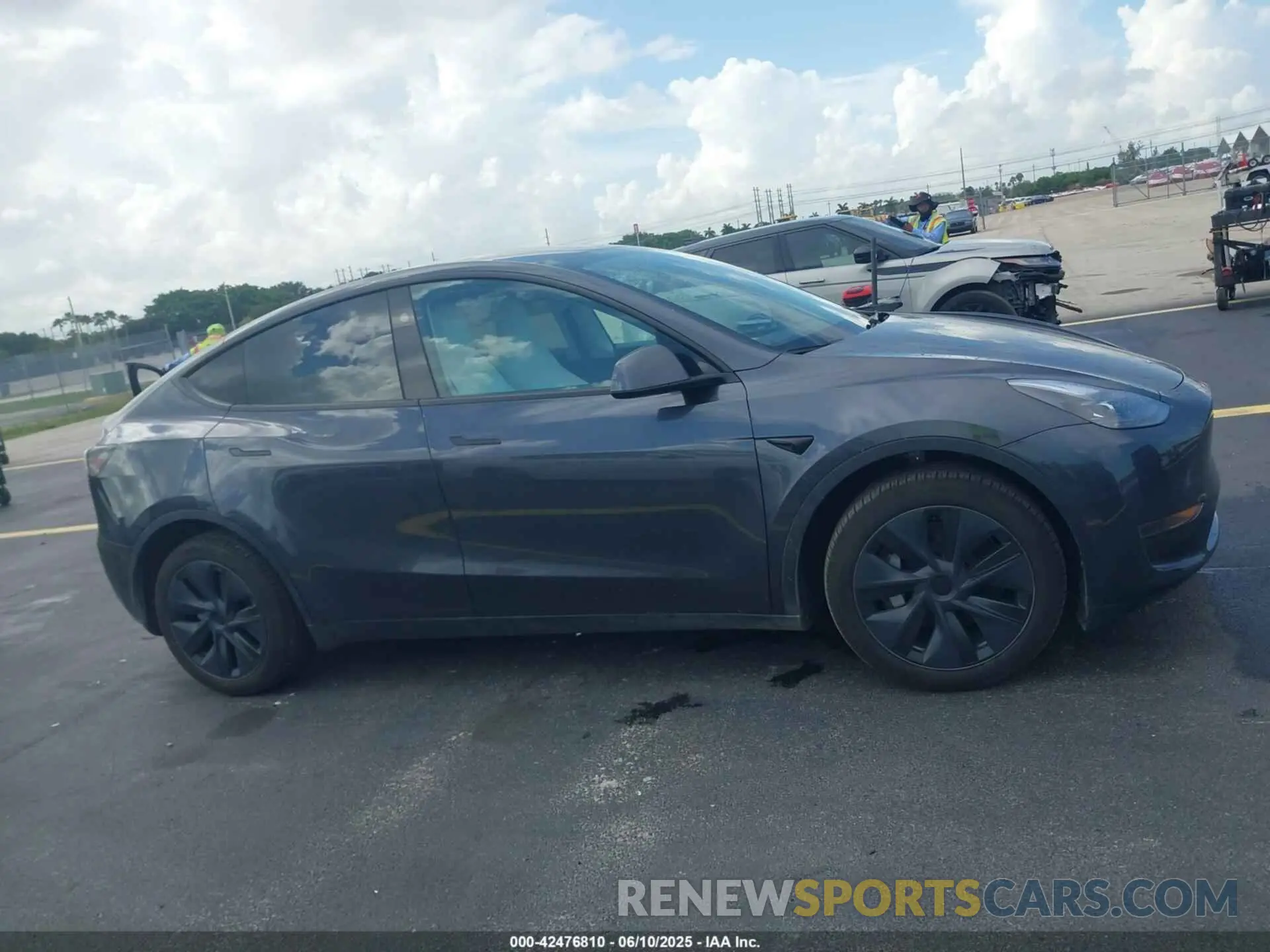 12 Photograph of a damaged car 7SAYGDED5SA371404 TESLA MODEL Y 2025