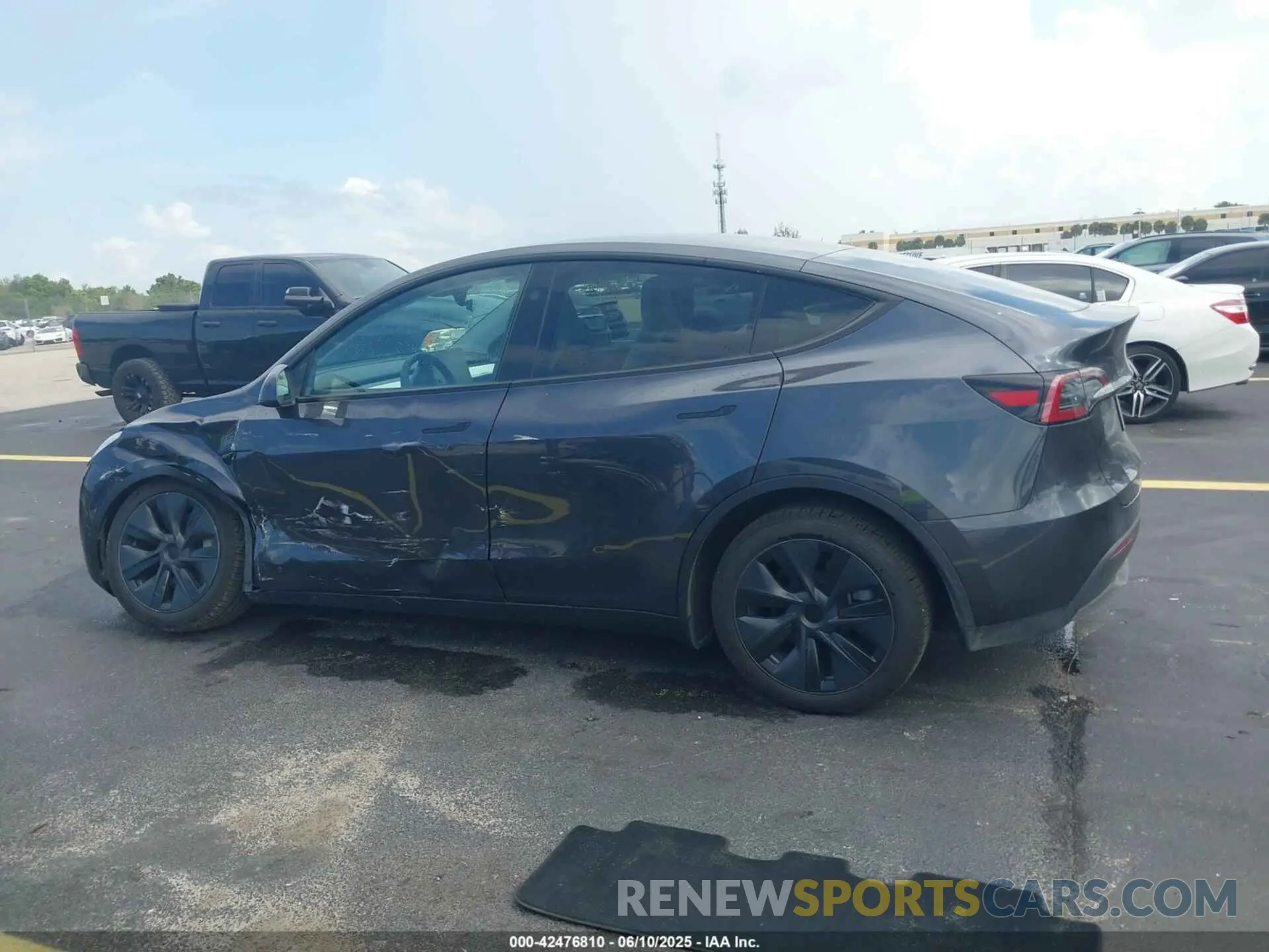 13 Photograph of a damaged car 7SAYGDED5SA371404 TESLA MODEL Y 2025