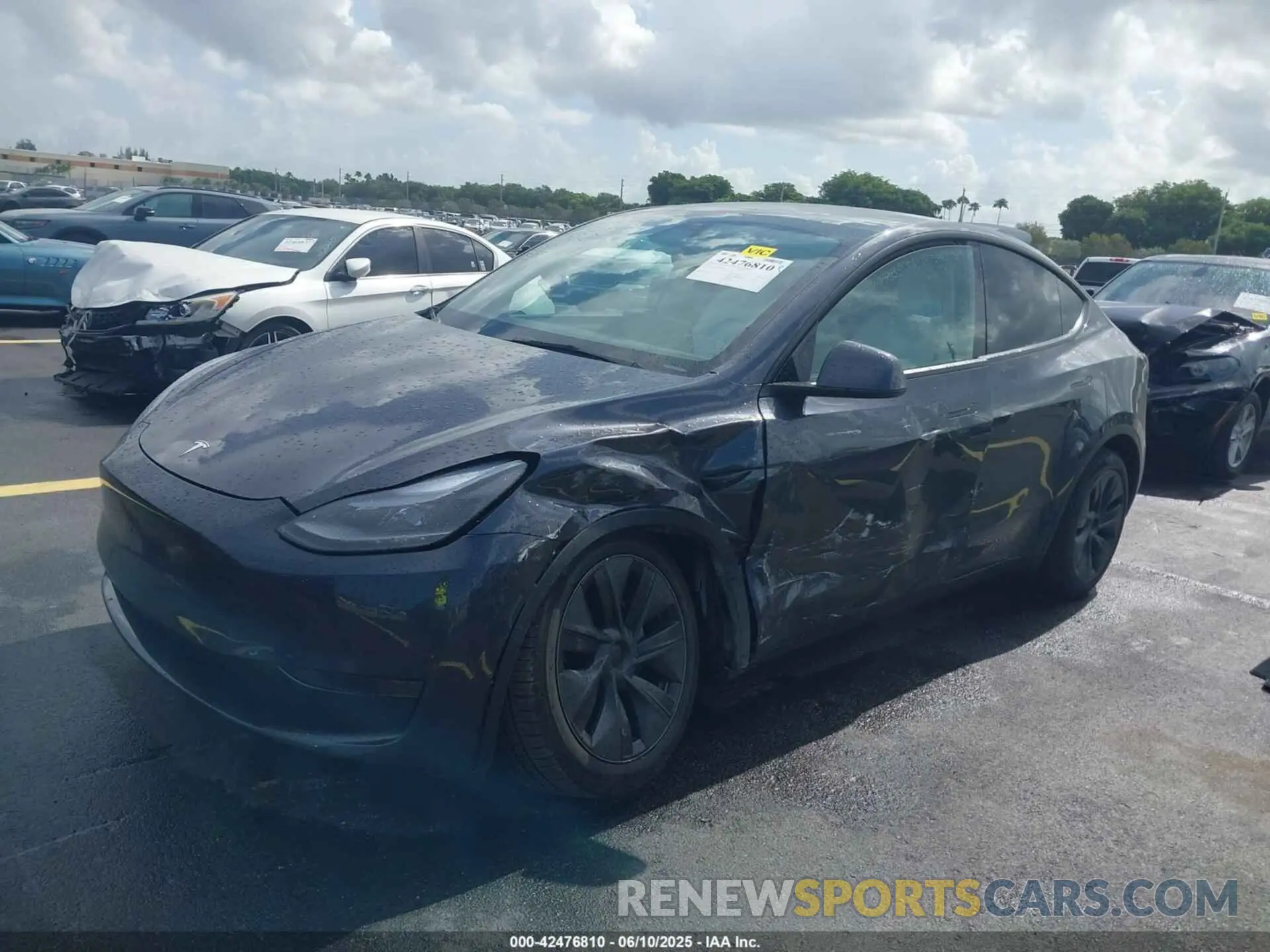 6 Photograph of a damaged car 7SAYGDED5SA371404 TESLA MODEL Y 2025