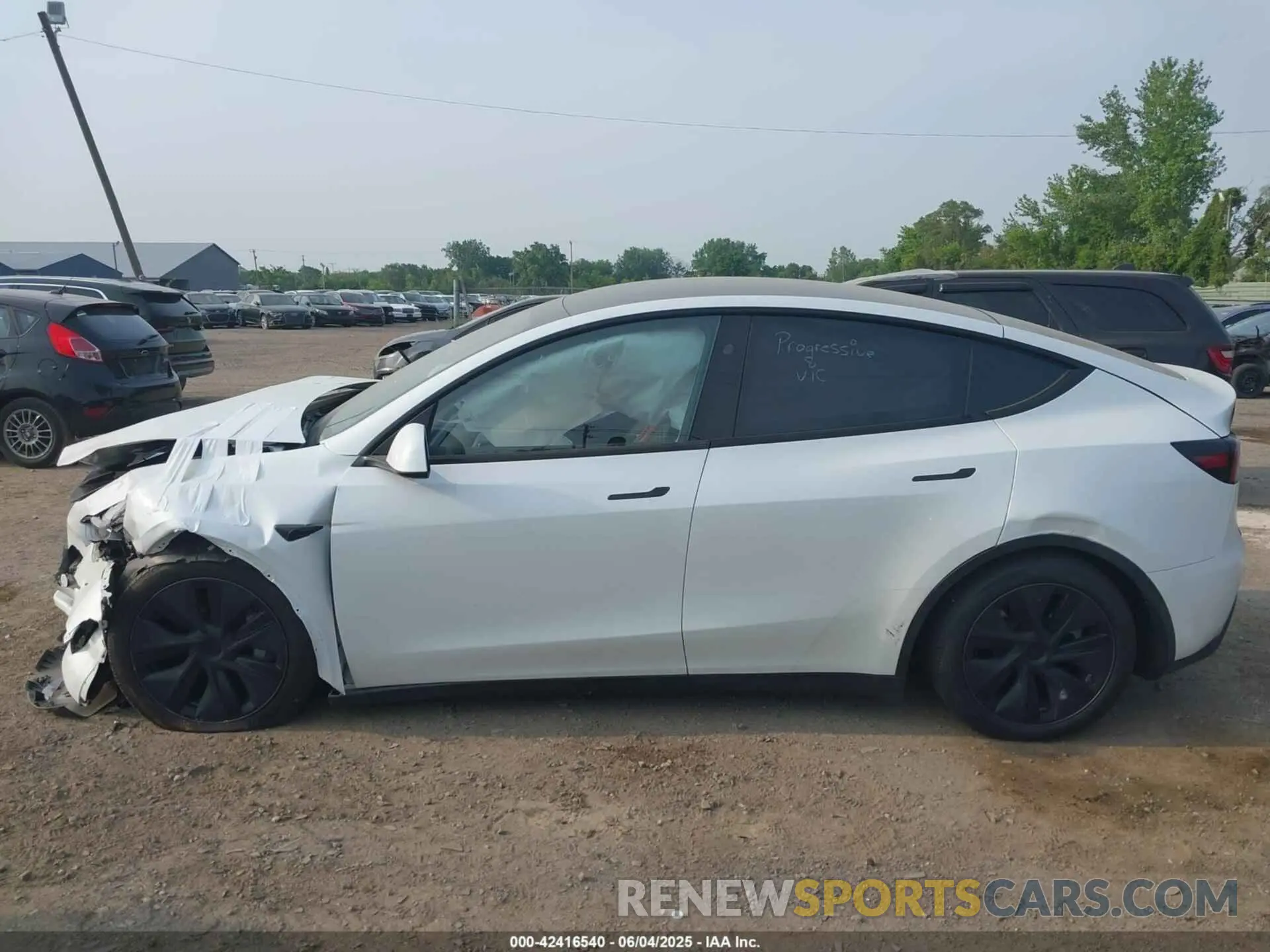14 Photograph of a damaged car 7SAYGDED5SF244428 TESLA MODEL Y 2025