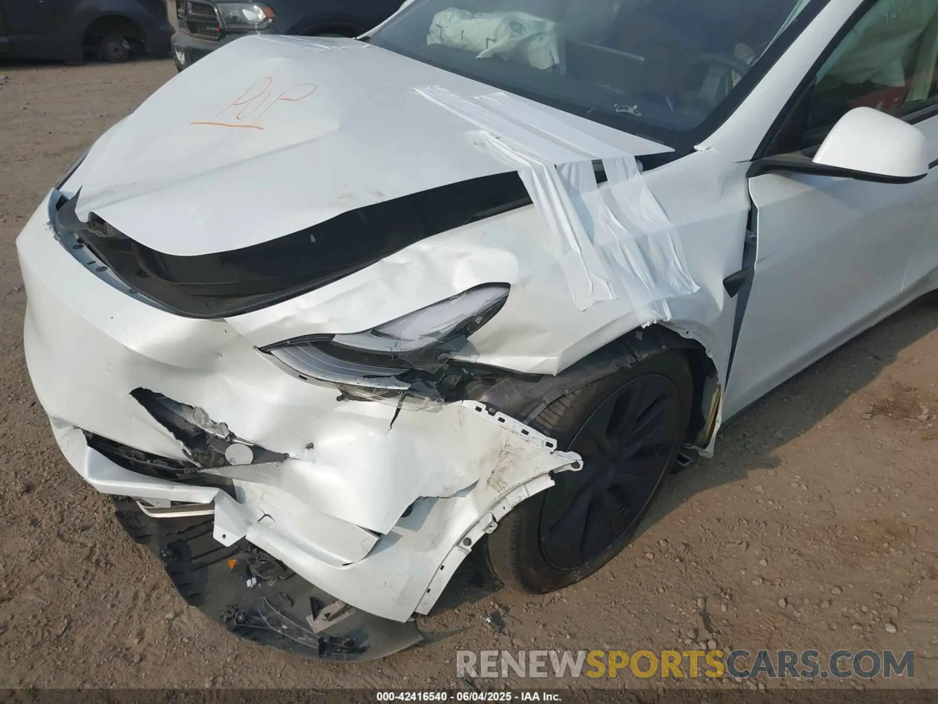 6 Photograph of a damaged car 7SAYGDED5SF244428 TESLA MODEL Y 2025