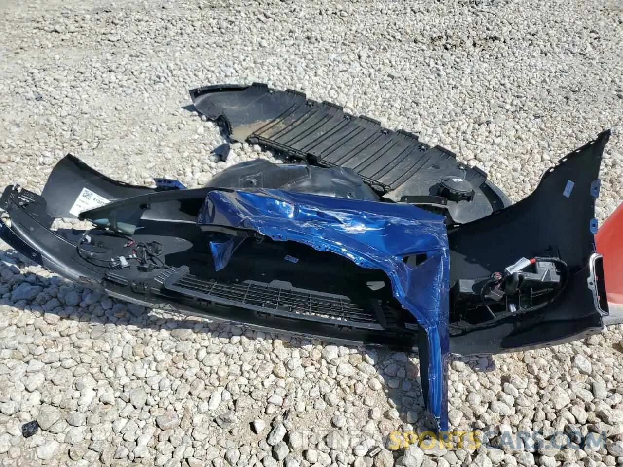 12 Photograph of a damaged car 7SAYGDED6SA374456 TESLA MODEL Y 2025