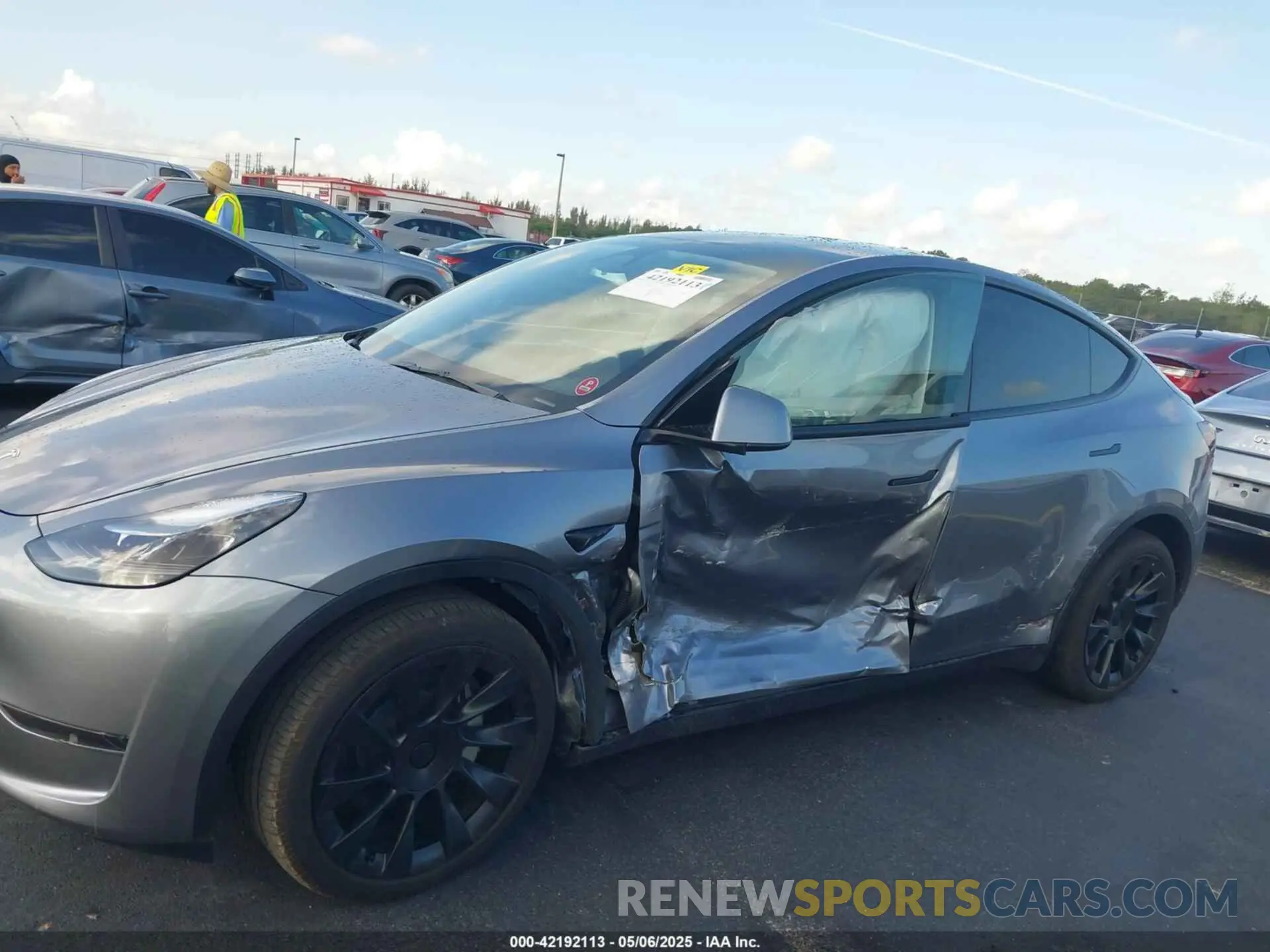 6 Photograph of a damaged car 7SAYGDED6SA375445 TESLA MODEL Y 2025
