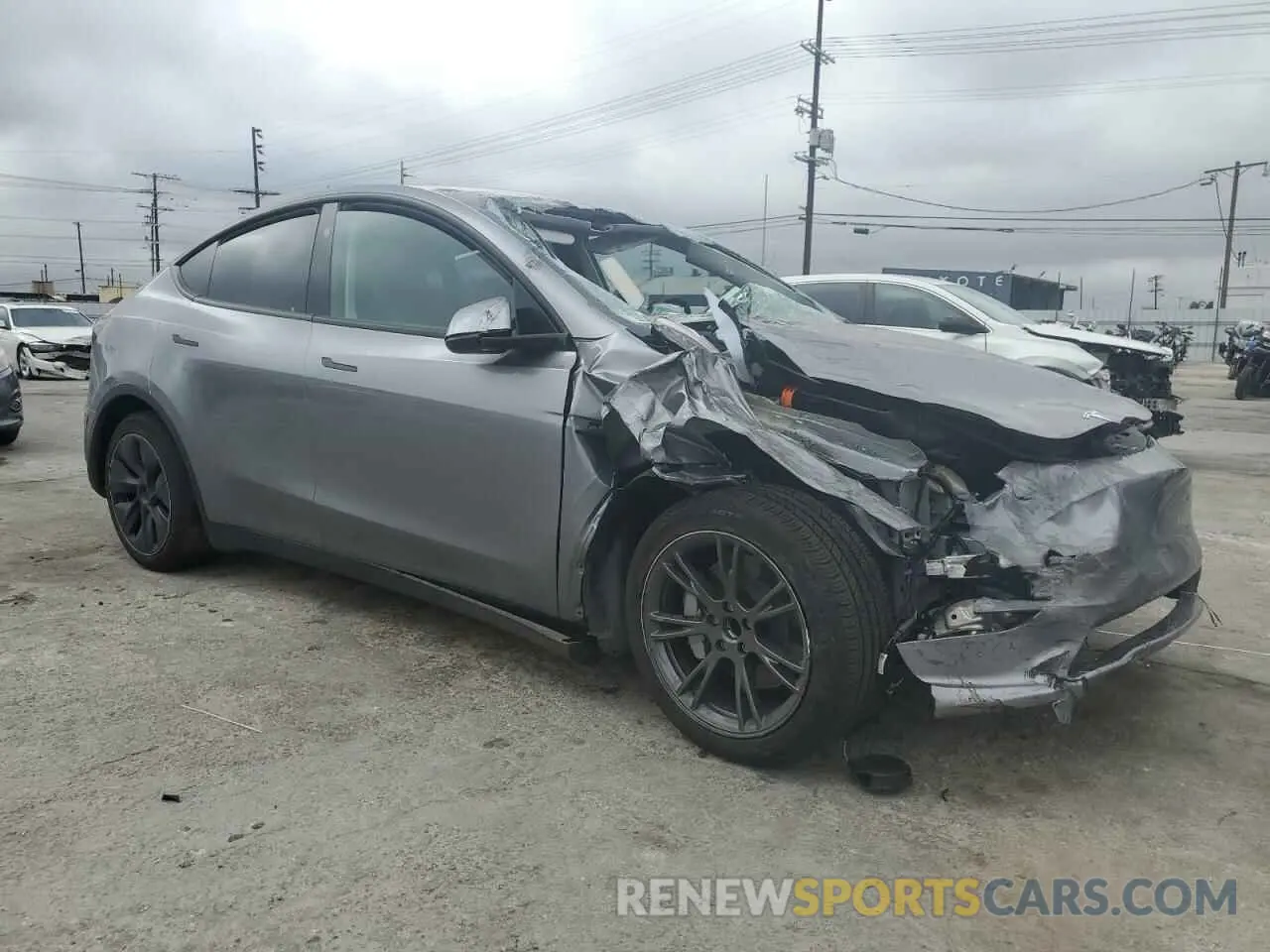 4 Photograph of a damaged car 7SAYGDED6SF256765 TESLA MODEL Y 2025