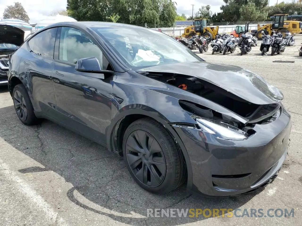 4 Photograph of a damaged car 7SAYGDED6SF314843 TESLA MODEL Y 2025