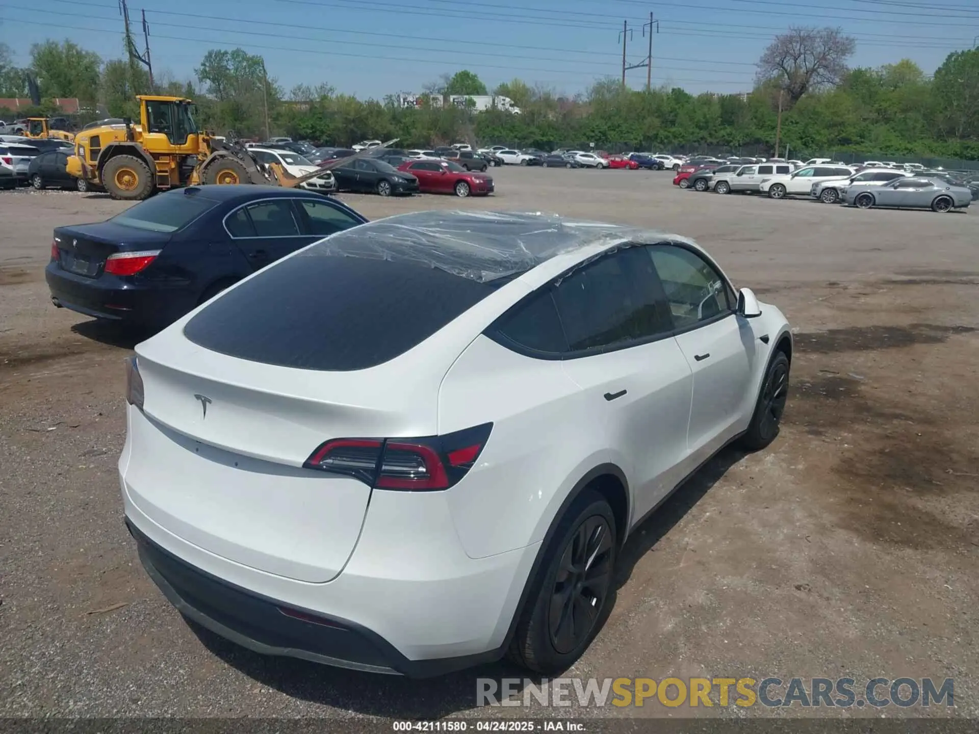 19 Photograph of a damaged car 7SAYGDED7SA378872 TESLA MODEL Y 2025