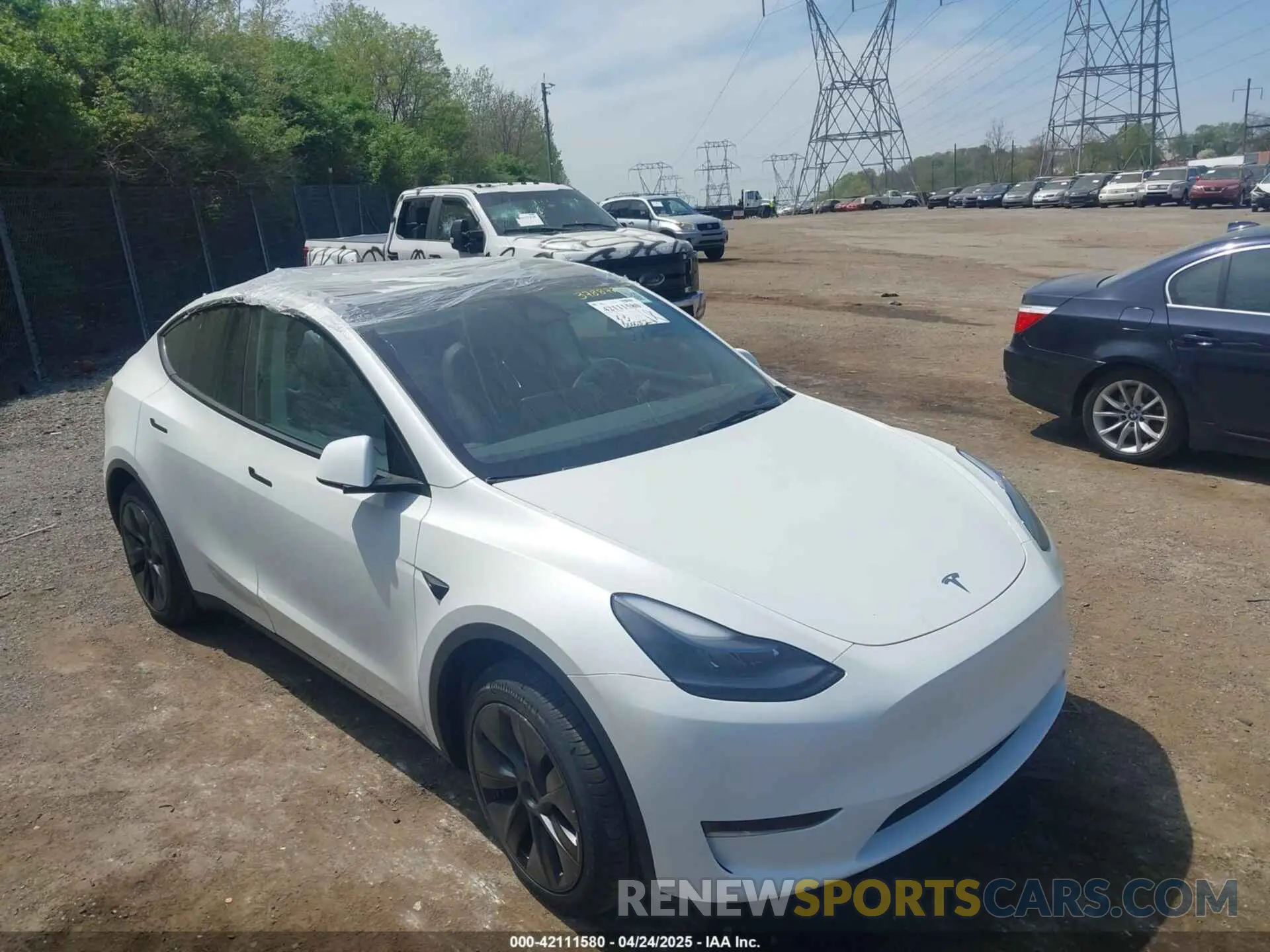 6 Photograph of a damaged car 7SAYGDED7SA378872 TESLA MODEL Y 2025