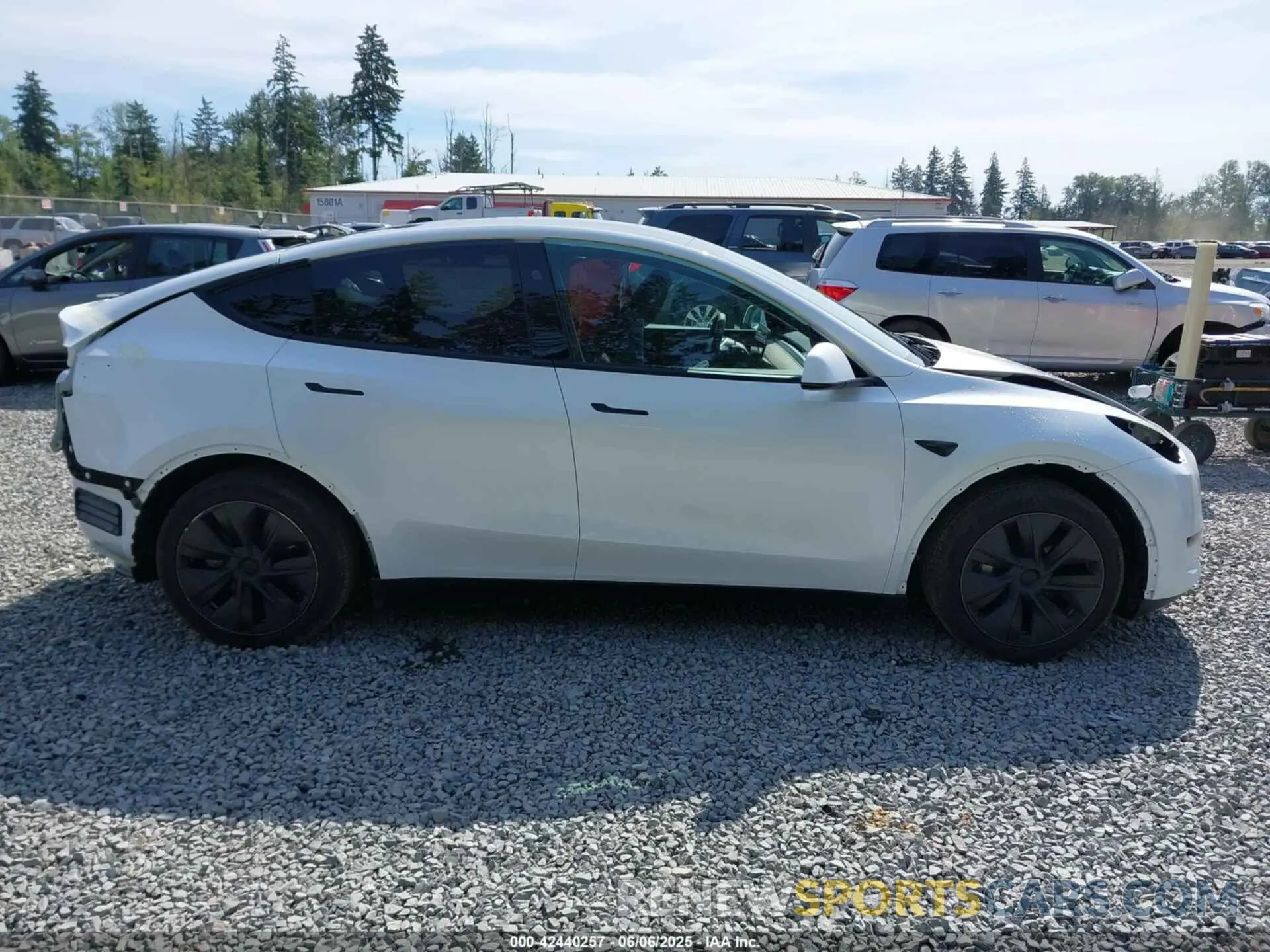 14 Photograph of a damaged car 7SAYGDED8SA351745 TESLA MODEL Y 2025