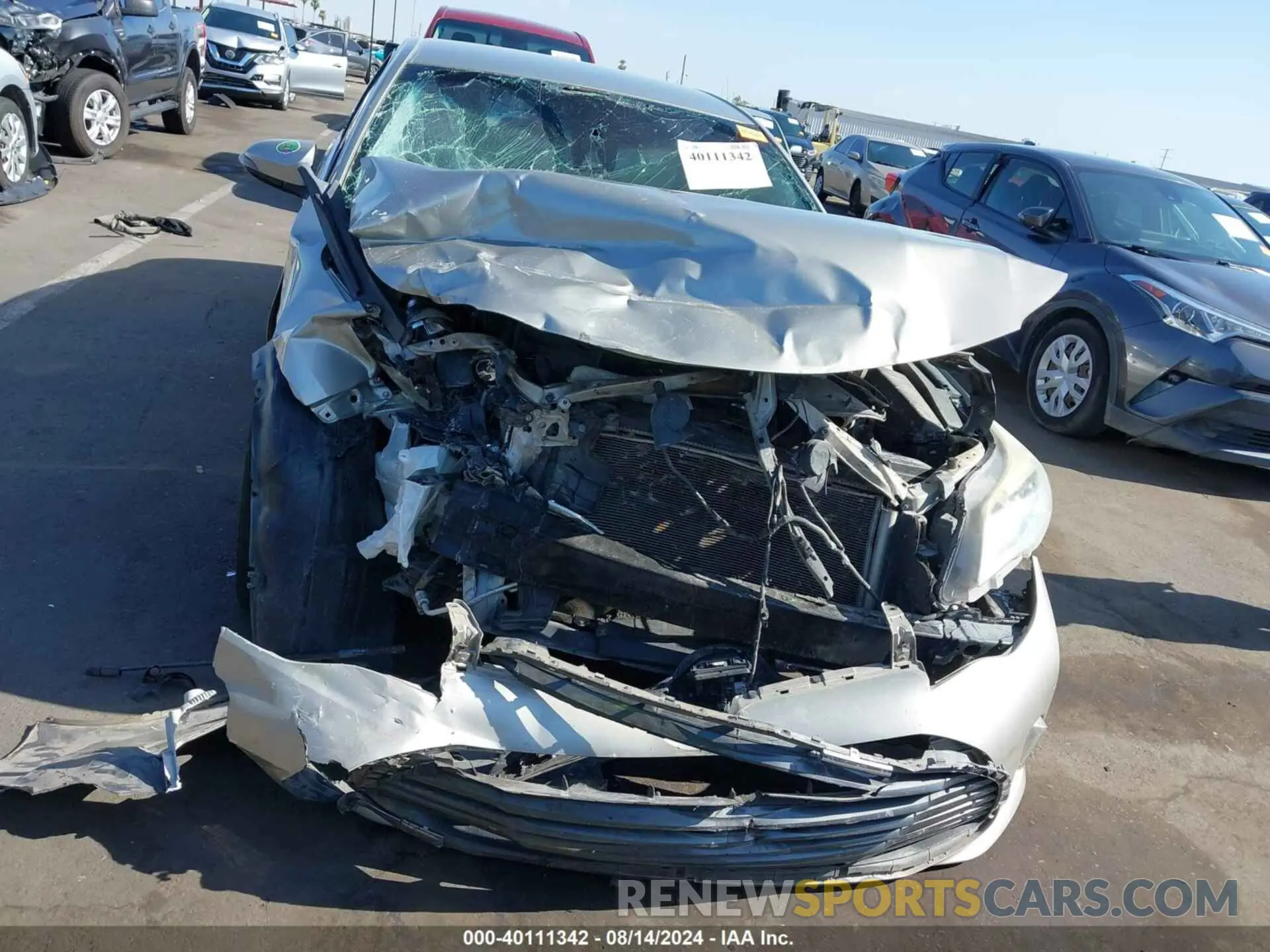 11 Photograph of a damaged car 4T1BK1EB0JU277871 TOYOTA AVALON 2018