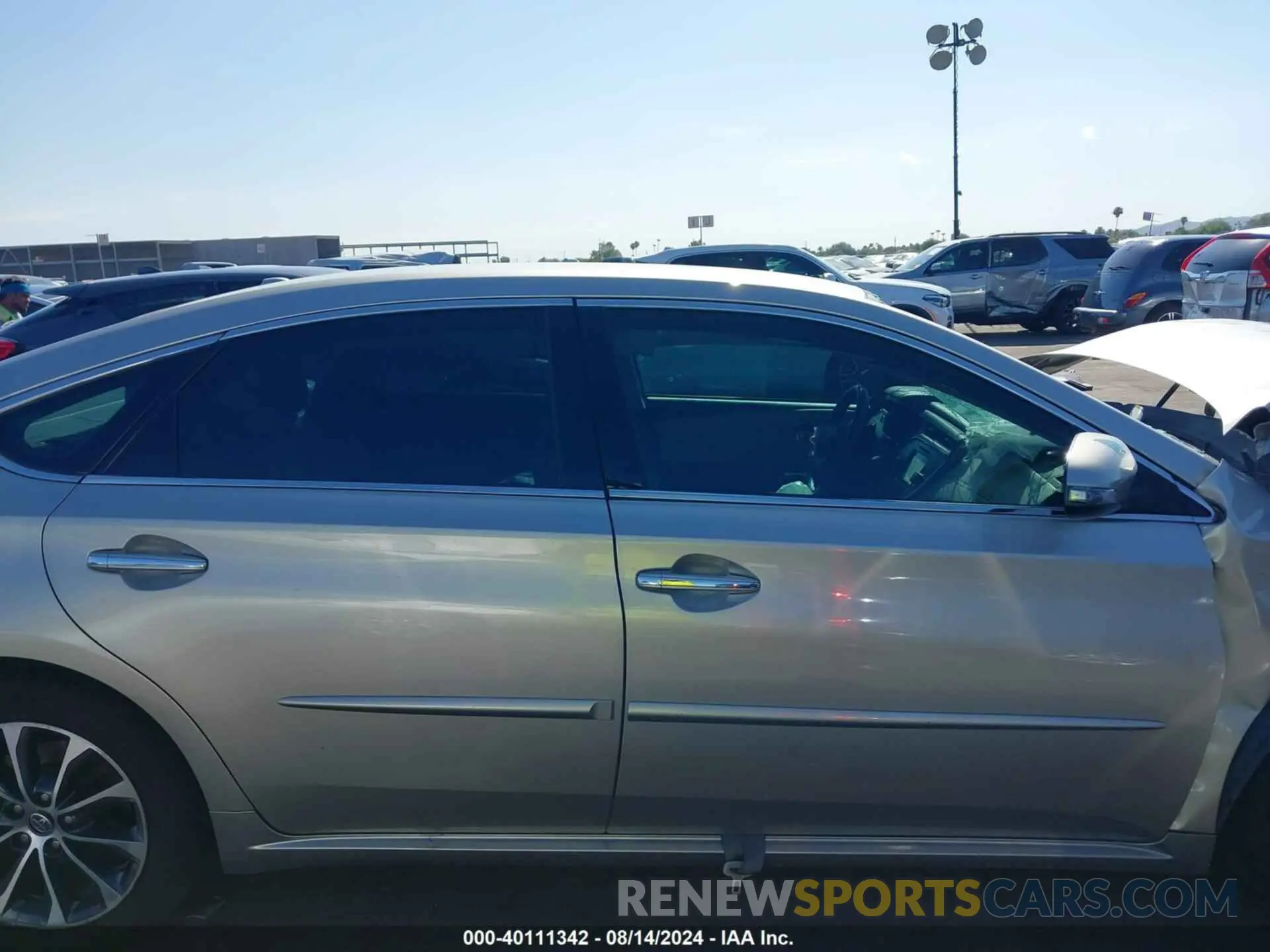 12 Photograph of a damaged car 4T1BK1EB0JU277871 TOYOTA AVALON 2018