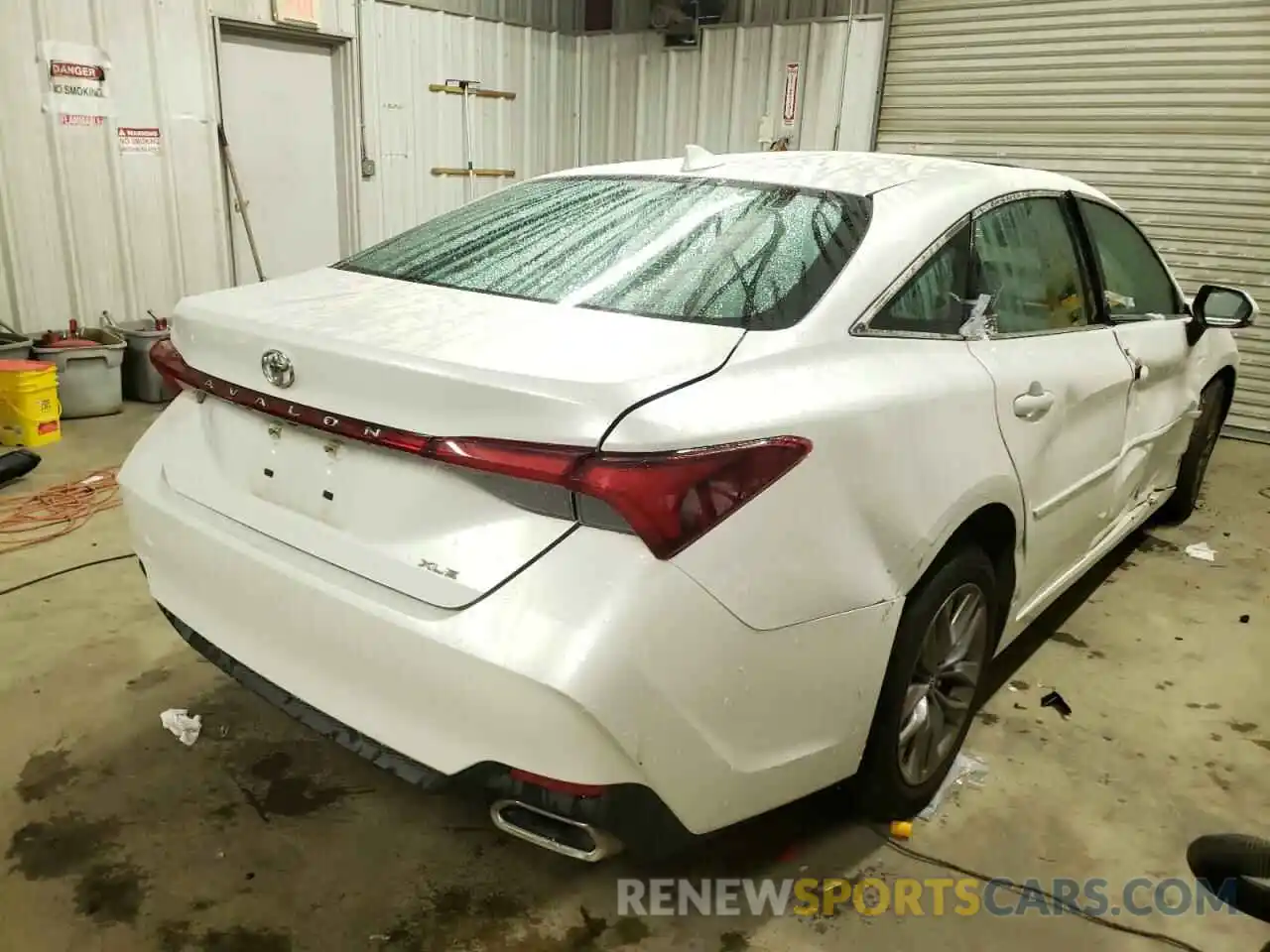 4 Photograph of a damaged car 4T1BZ1FB3KU034289 TOYOTA AVALON 2019