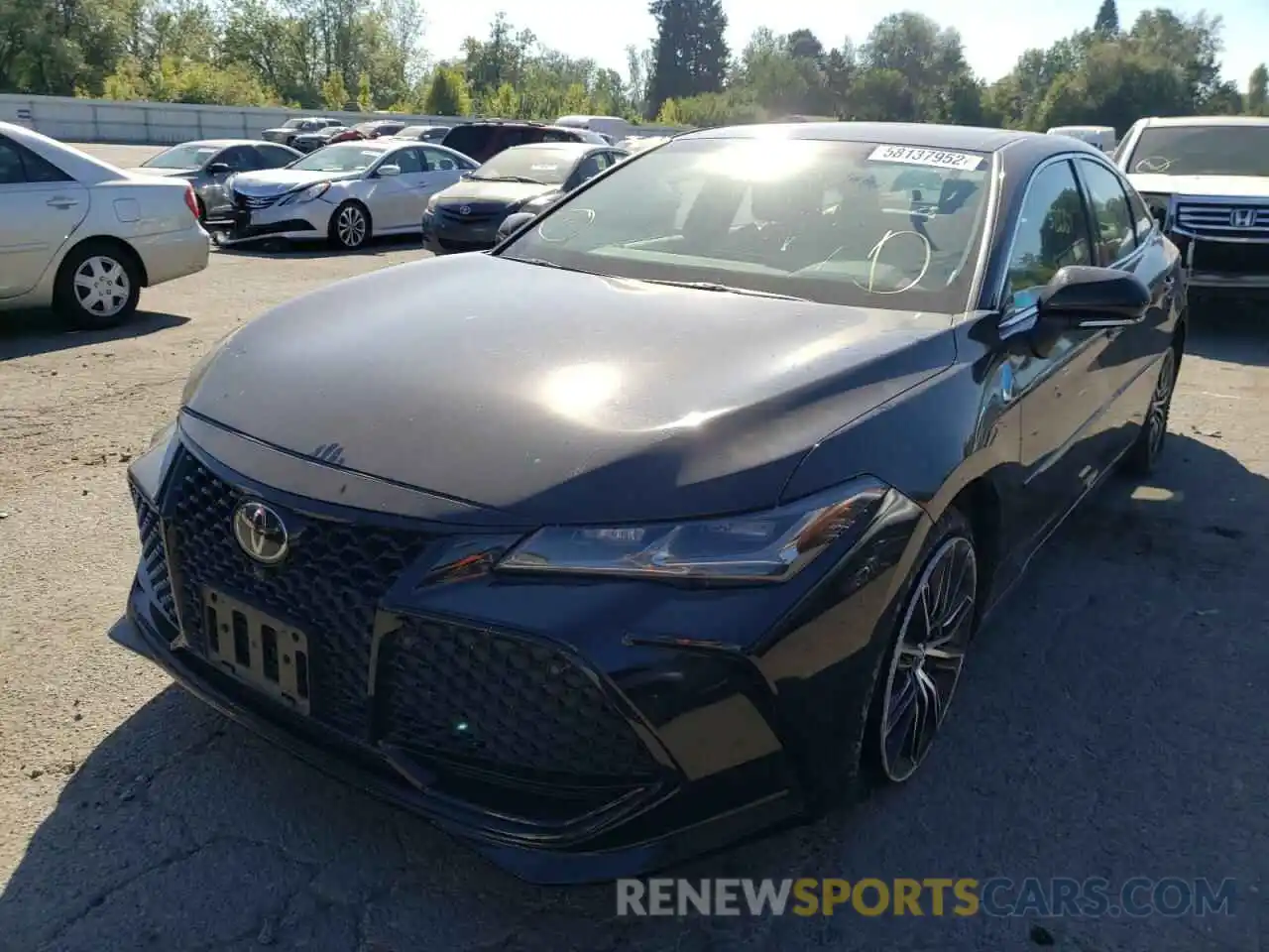 2 Photograph of a damaged car 4T1BZ1FB4KU009451 TOYOTA AVALON 2019