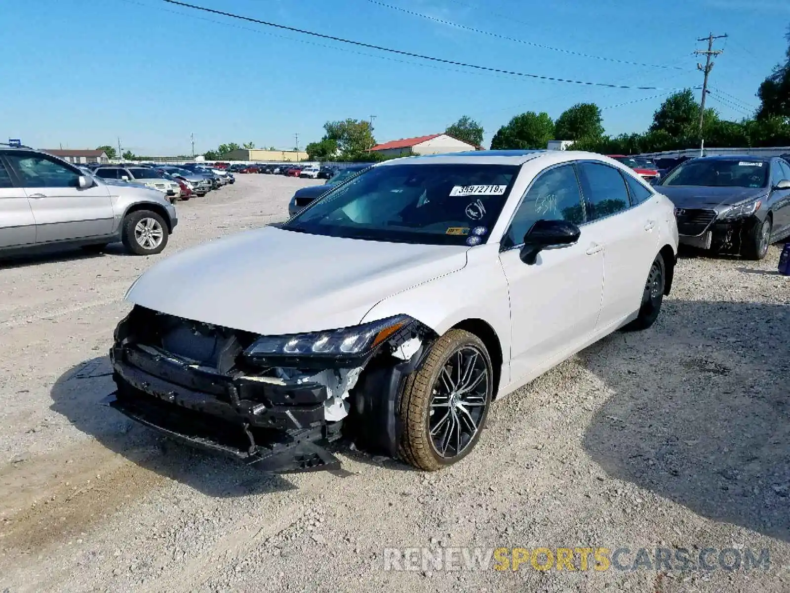 2 Photograph of a damaged car 4T1BZ1FB4KU015136 TOYOTA AVALON 2019