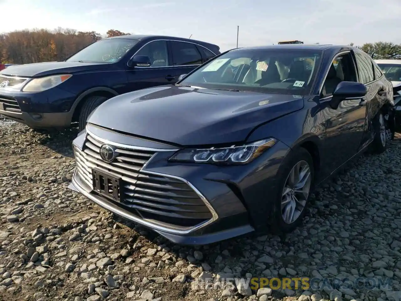 2 Photograph of a damaged car 4T1BZ1FB4KU033216 TOYOTA AVALON 2019