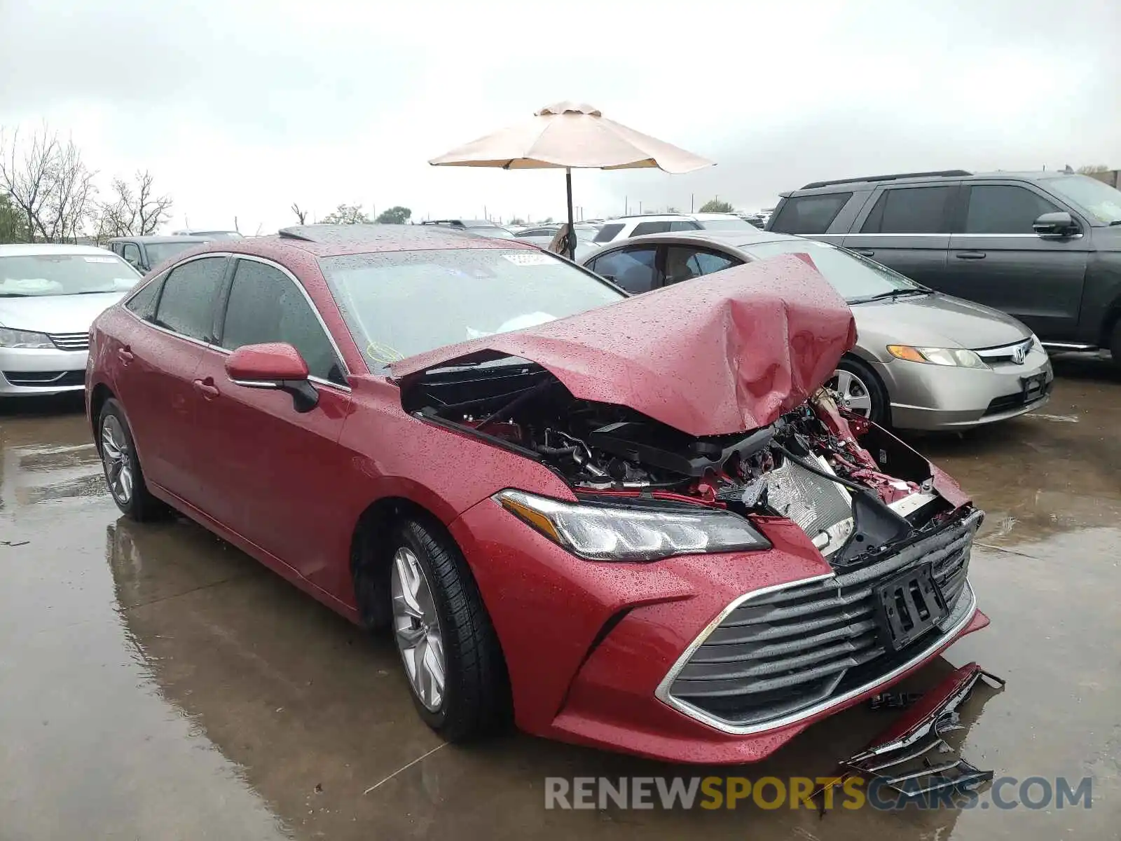 1 Photograph of a damaged car 4T1BZ1FB5KU003321 TOYOTA AVALON 2019