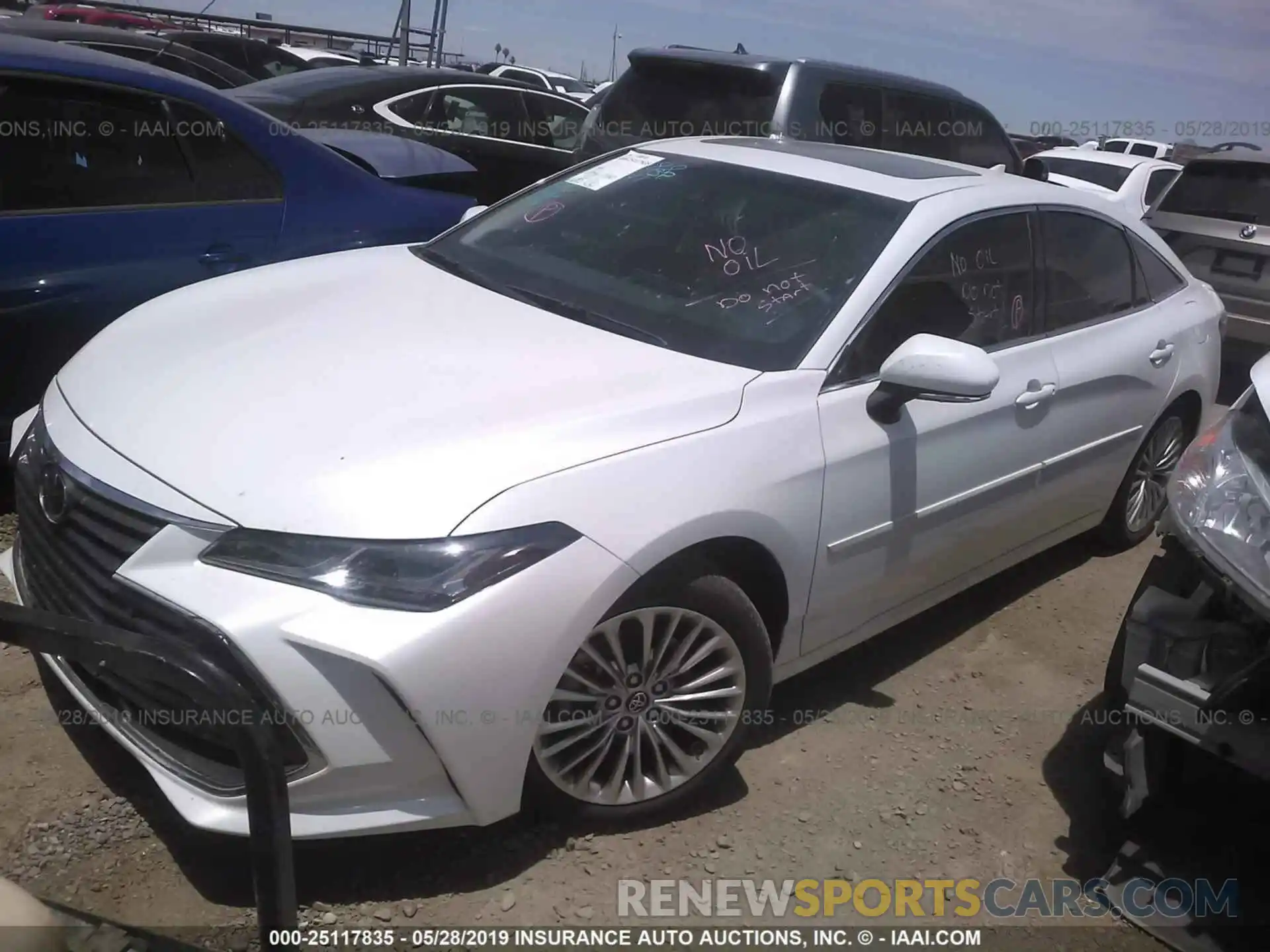 2 Photograph of a damaged car 4T1BZ1FB5KU010415 TOYOTA AVALON 2019