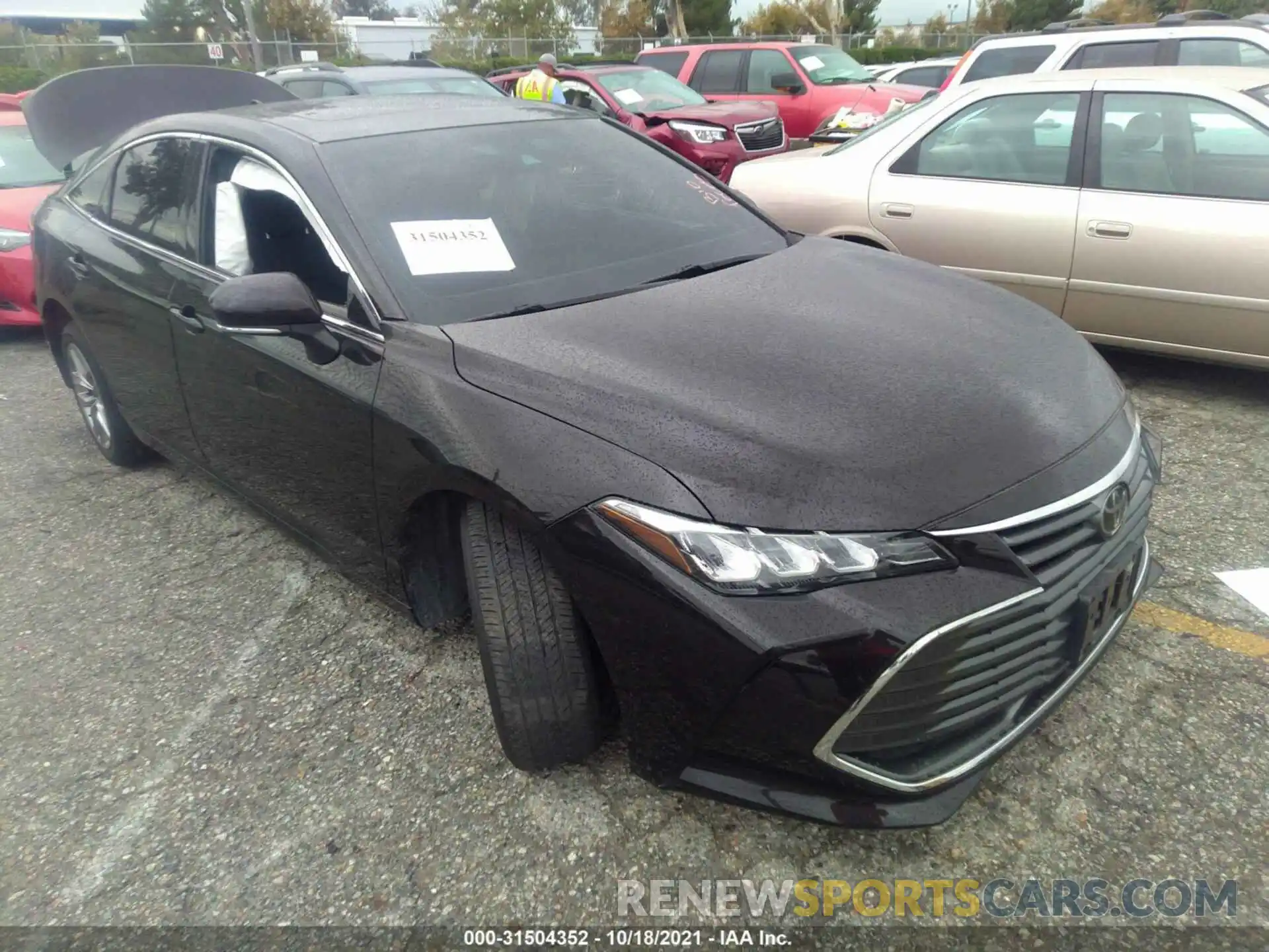 1 Photograph of a damaged car 4T1BZ1FB6KU001299 TOYOTA AVALON 2019