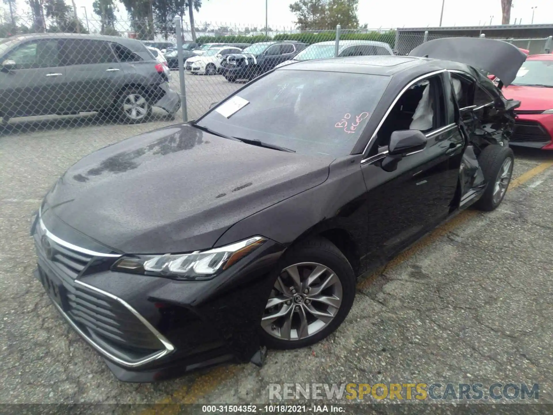 2 Photograph of a damaged car 4T1BZ1FB6KU001299 TOYOTA AVALON 2019