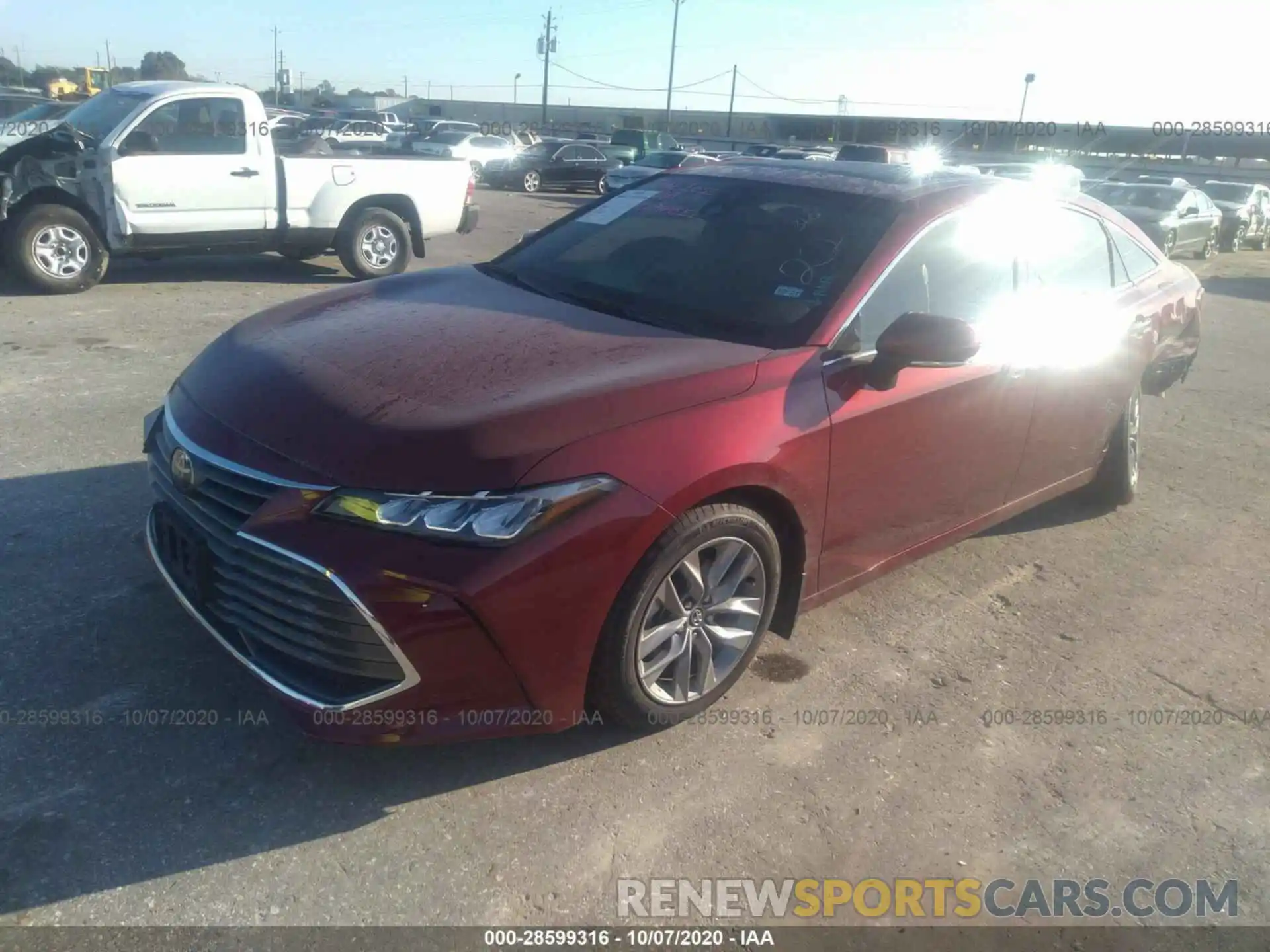 2 Photograph of a damaged car 4T1AZ1FB5LU039619 TOYOTA AVALON 2020