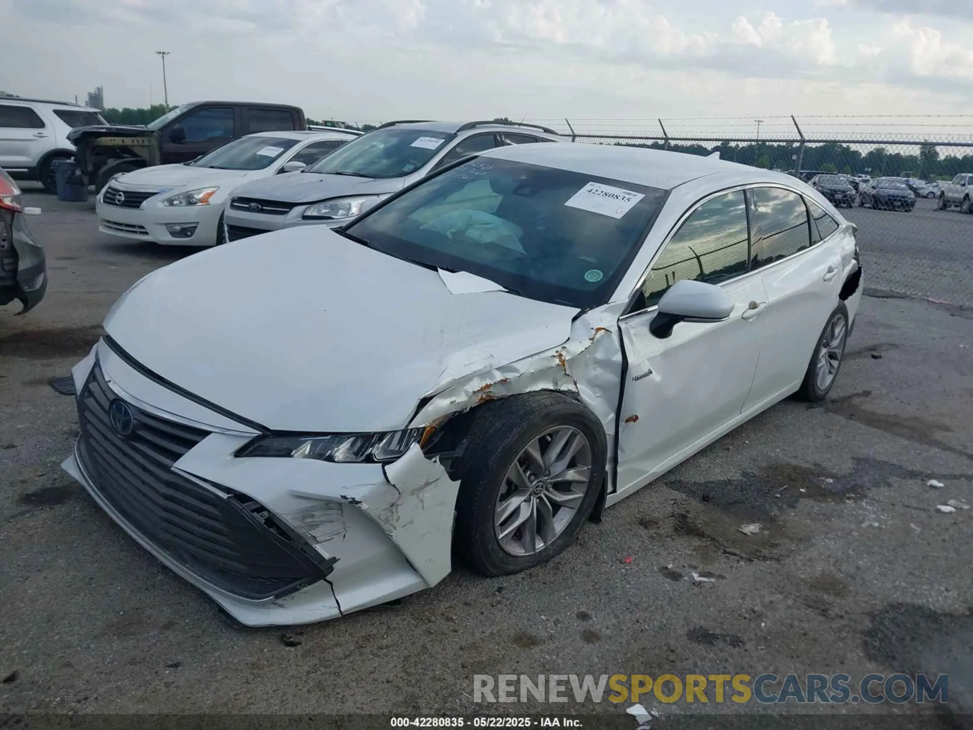 2 Photograph of a damaged car 4T1JA1AB0MU007581 TOYOTA AVALON 2021