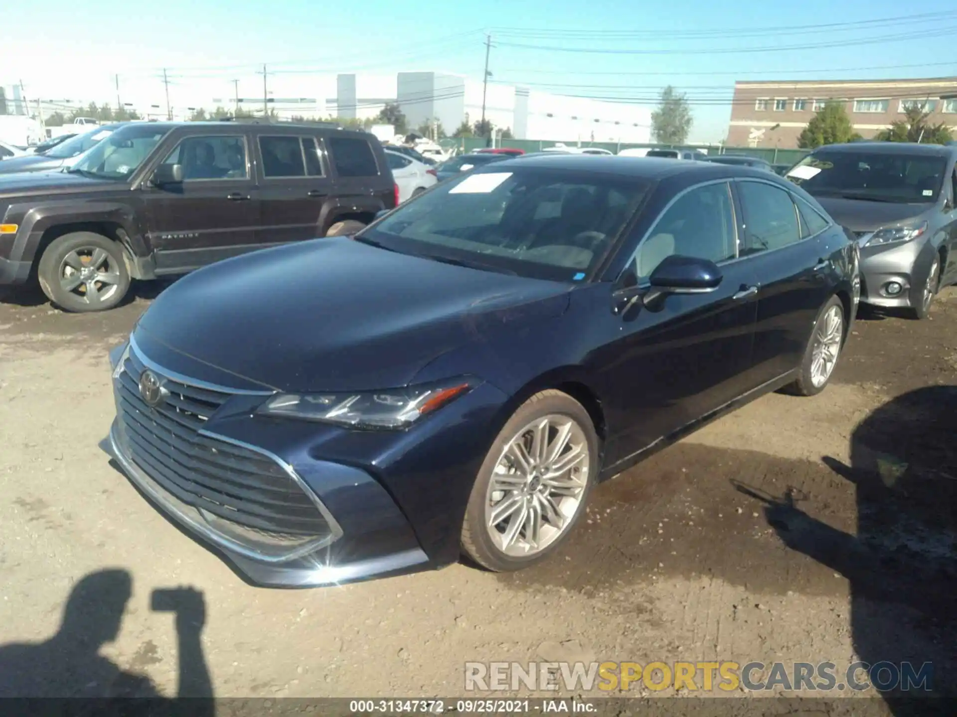 2 Photograph of a damaged car 4T1NB1BB7MU001970 TOYOTA AVALON 2021