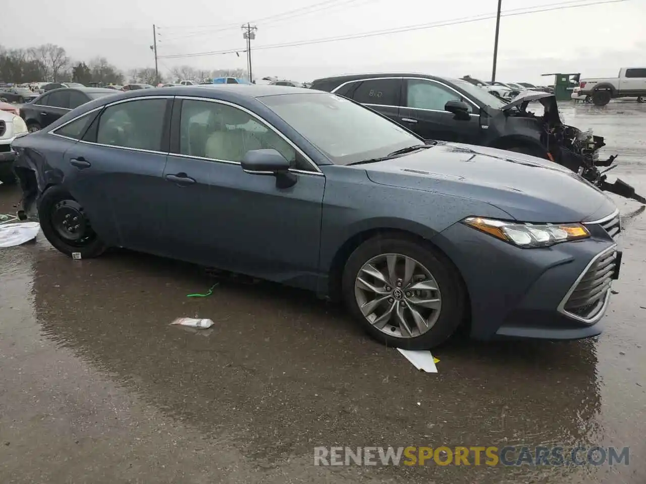 4 Photograph of a damaged car 4T1AZ1FB1NU084186 TOYOTA AVALON 2022