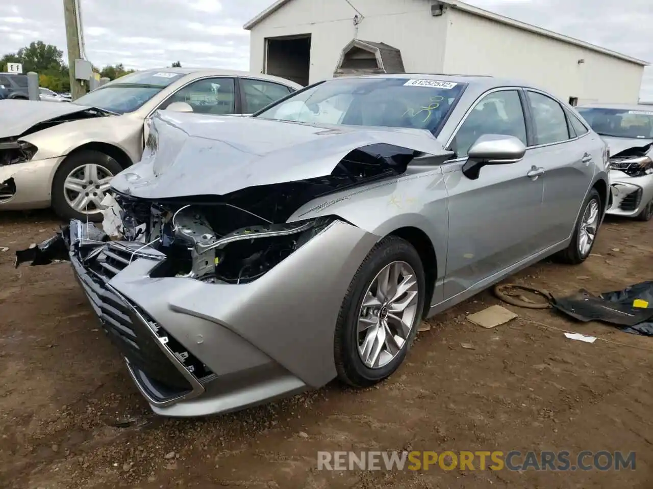 2 Photograph of a damaged car 4T1AZ1FB7NU087609 TOYOTA AVALON 2022