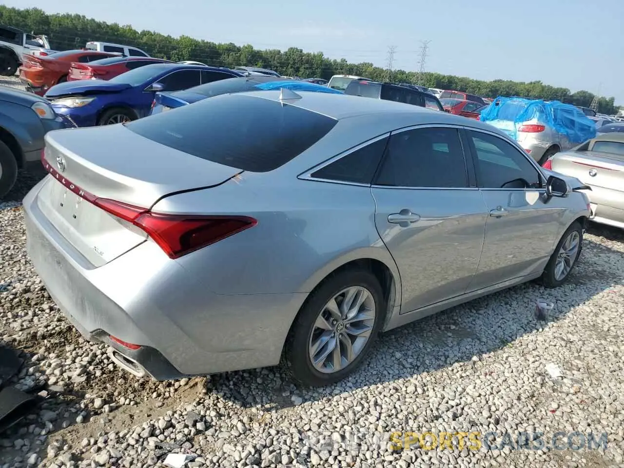 3 Photograph of a damaged car 4T1AZ1FB9NU088034 TOYOTA AVALON 2022