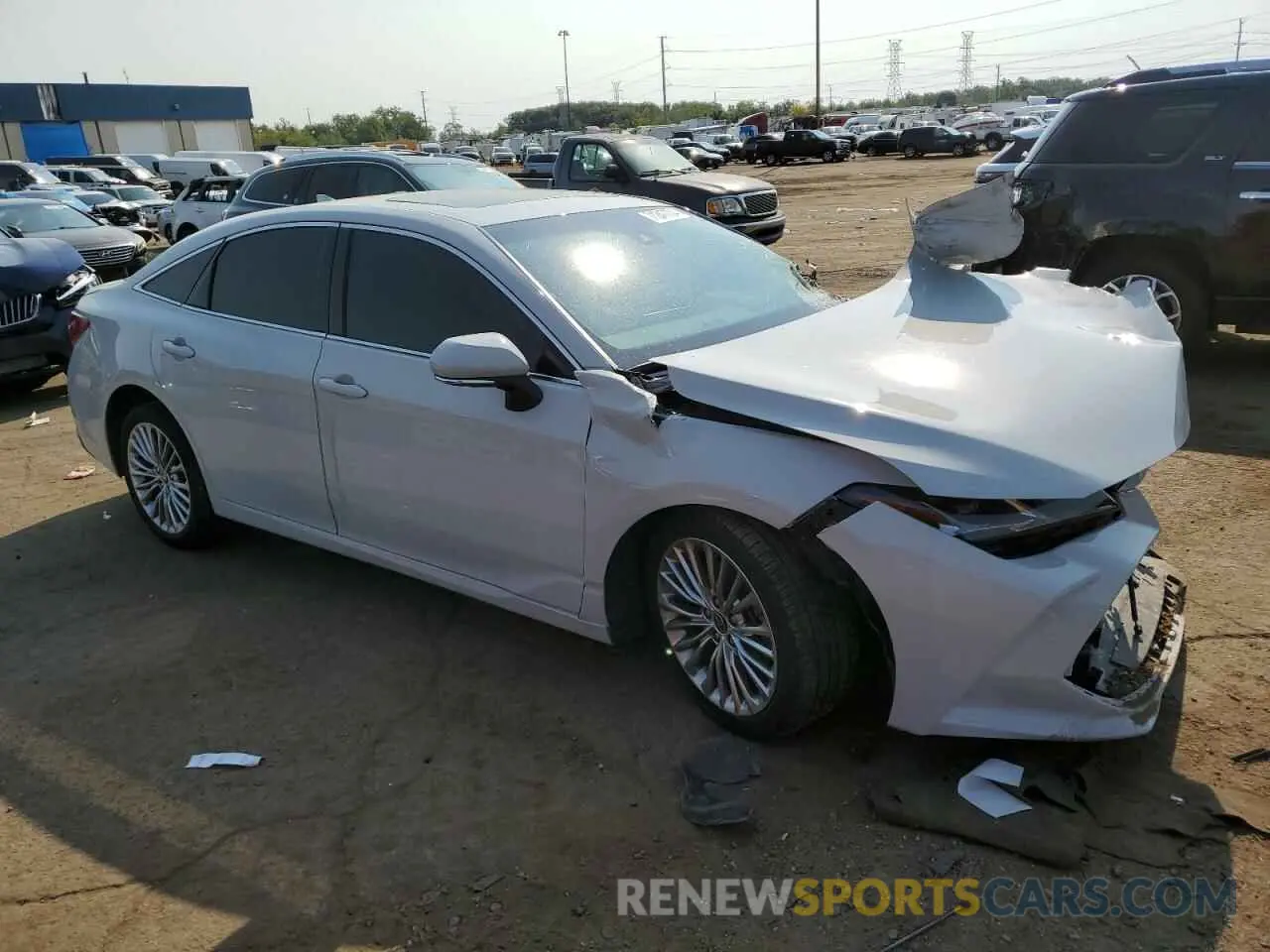 4 Photograph of a damaged car 4T1DA1AB0NU012729 TOYOTA AVALON 2022